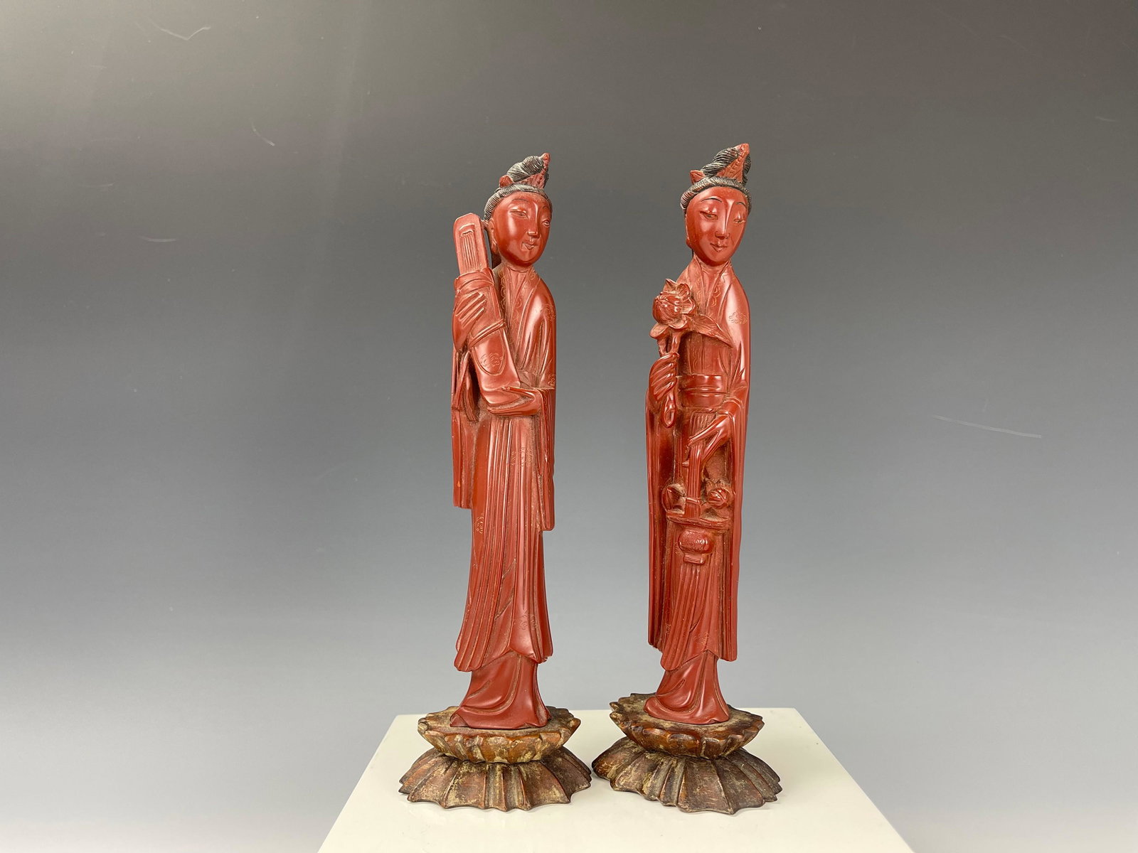 Two Carved and Lacquered Wood Guanyin Figures: Two Carved and Lacquered Wood Guanyin Figures. H 22 cm. (9 in.) x2. preview from Jun 6th to 10th from 2:00 PM TO 6:00 PM Eastern Time, Location: 15229 Display Court Rockville MD 20850.