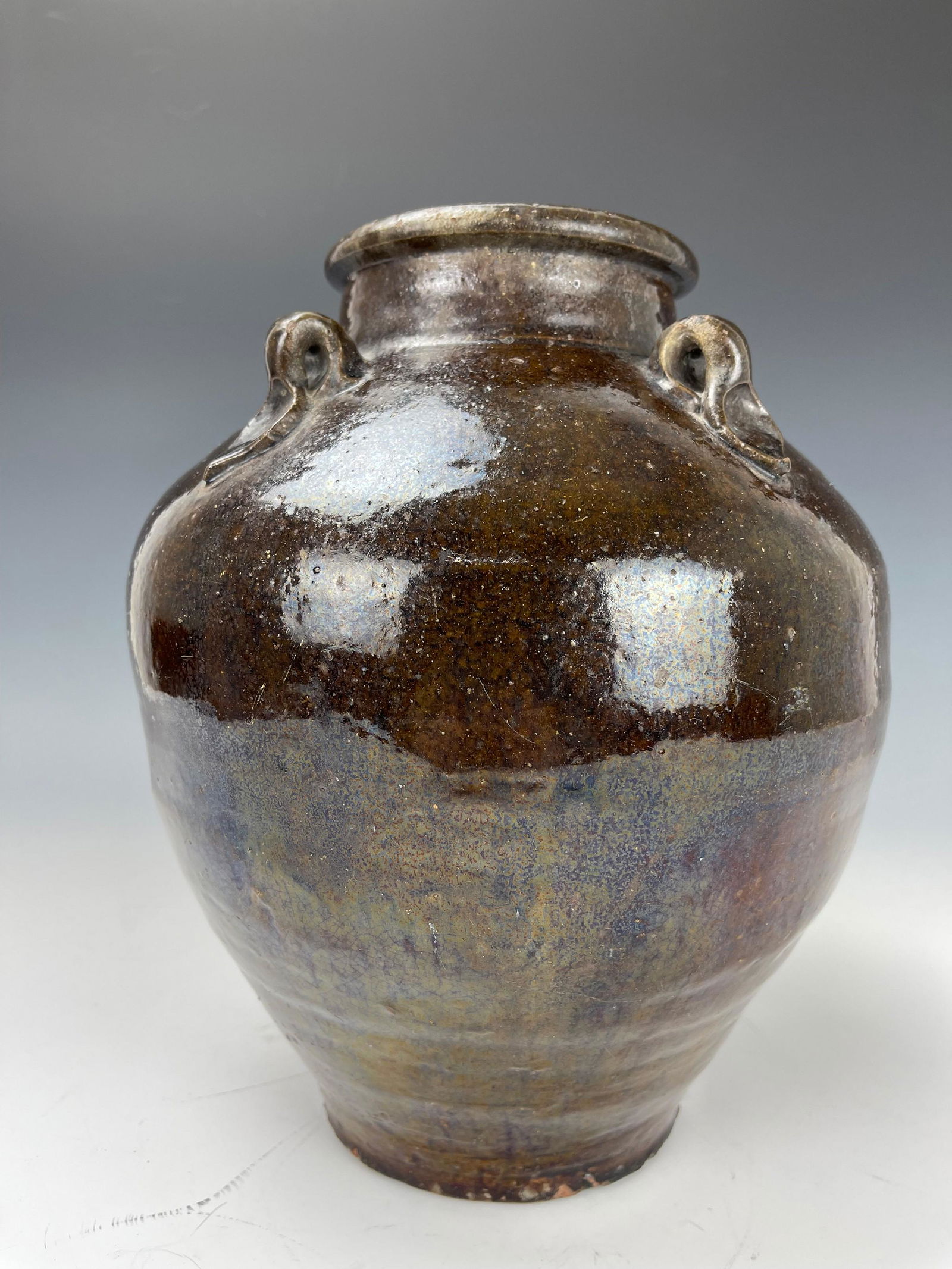 A Chinese Brown Glaze Ceramic Jar (1 of 4)