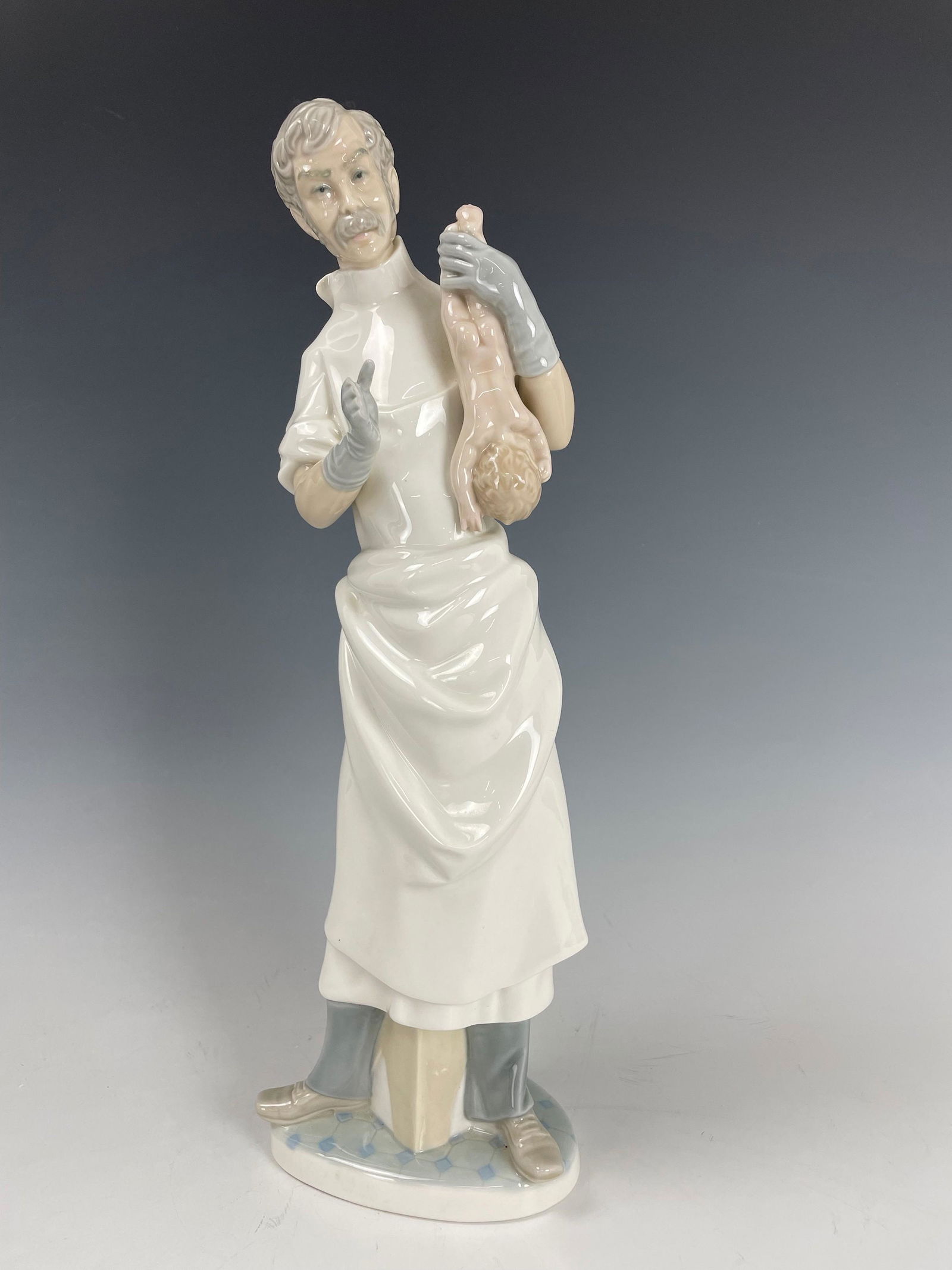 A Lladro Doctor Holding New Born Baby (1 of 6)