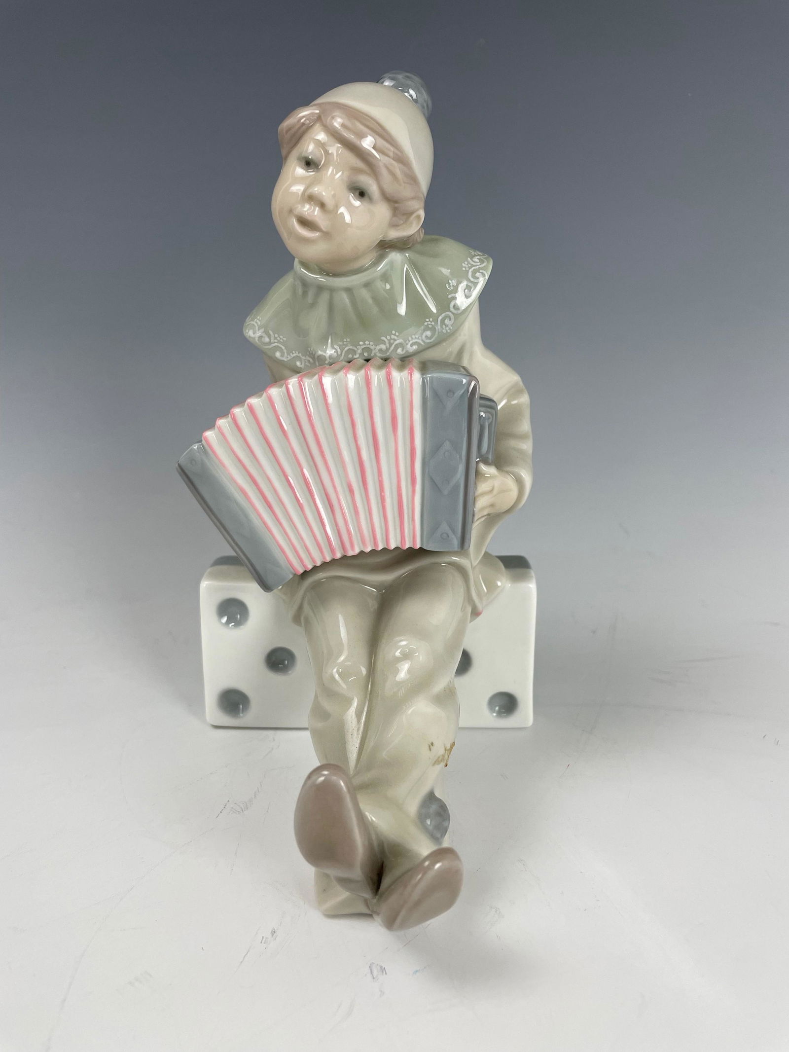 A Lladro Accordion Playing Figurine (1 of 5)