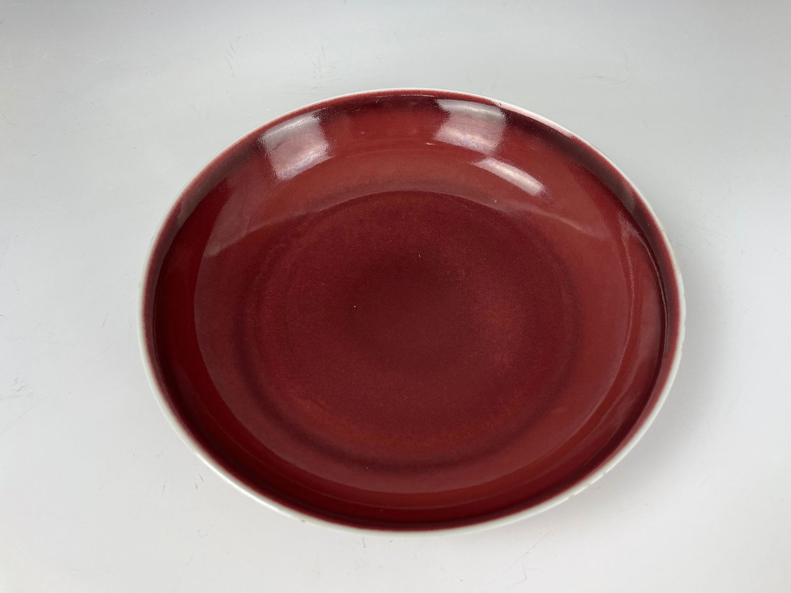 A Chinese Red Glaze Porcelain Plate Qianlong Mark (1 of 5)
