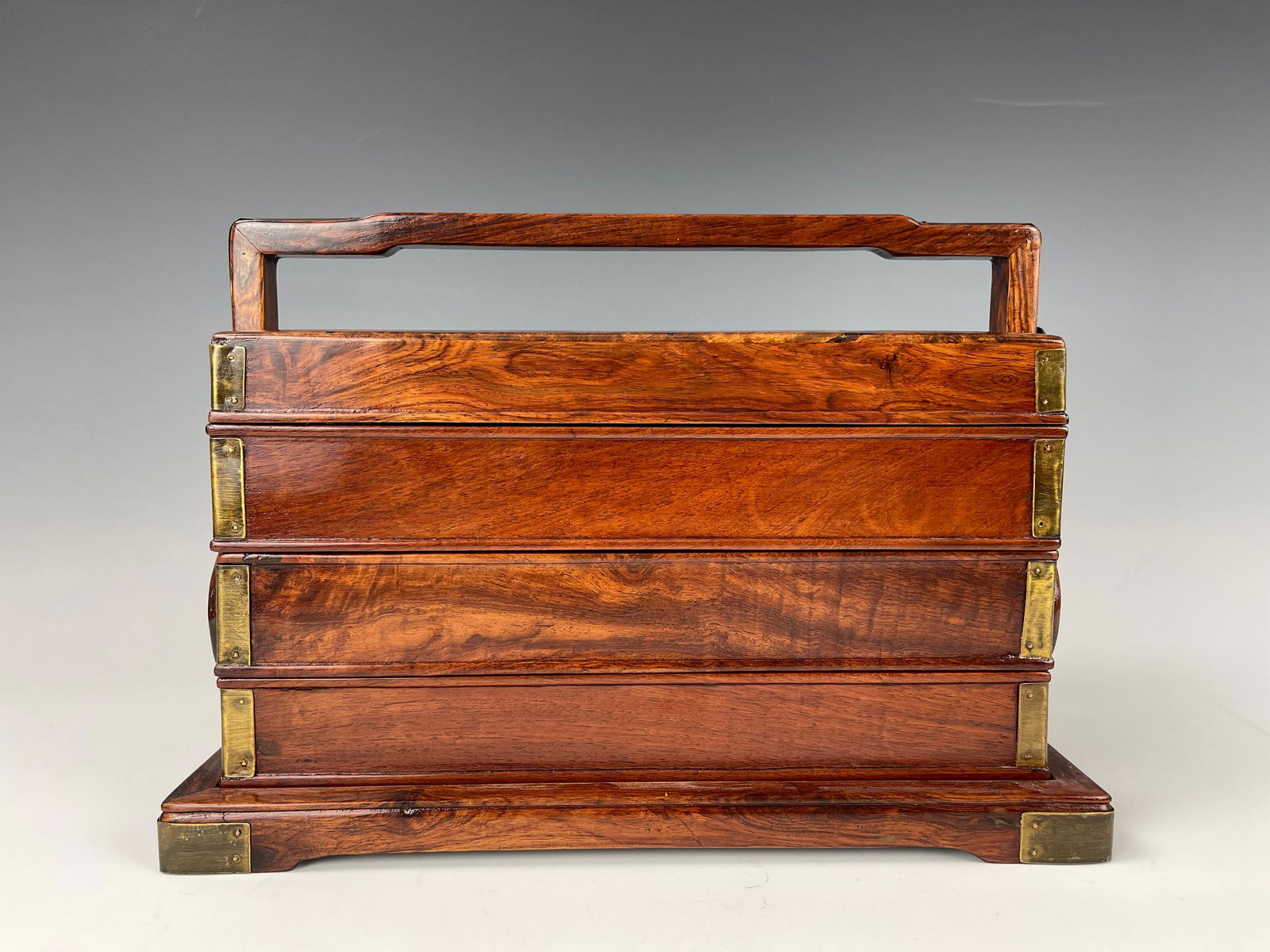 A HUANGHUALI THREE-TIERED PICNIC BOX, TIHE (1 of 9)