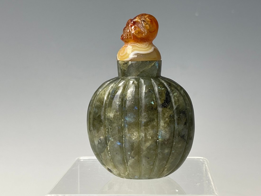 A Chinese Carved Jade Stone Snuff Bottle (1 of 5)