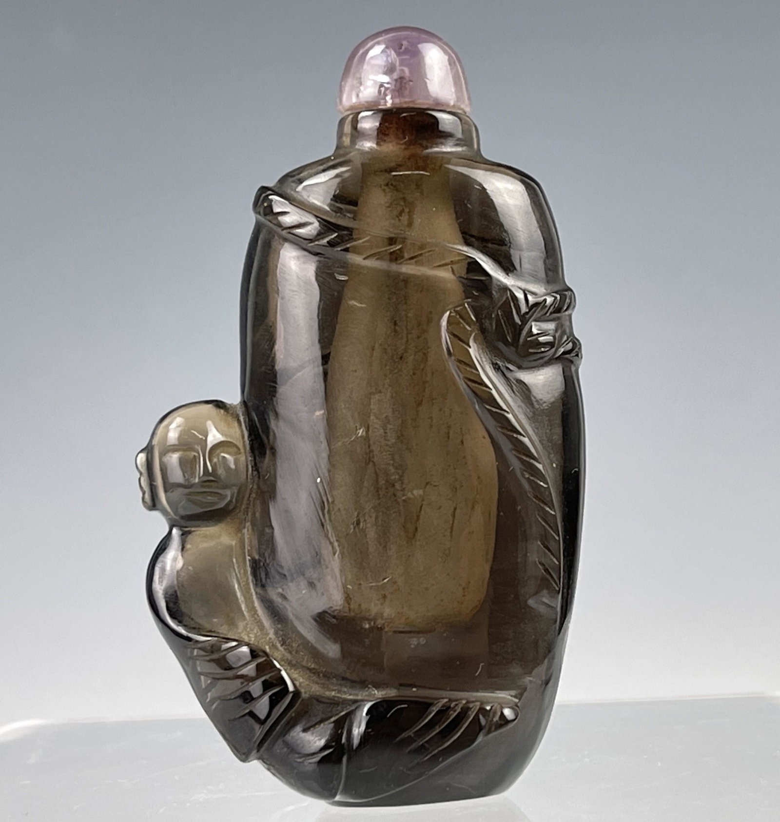 A Chinese Varved Crystal Snuff Bottle: A Chinese Varved Crystal Snuff Bottle, H 7 cm. (3 in.), Preview from Aug. 22nd to 26th from 2:00 PM TO 6:00 PM Eastern Time, Location: 15229 Display Court, Rockville MD 20850.