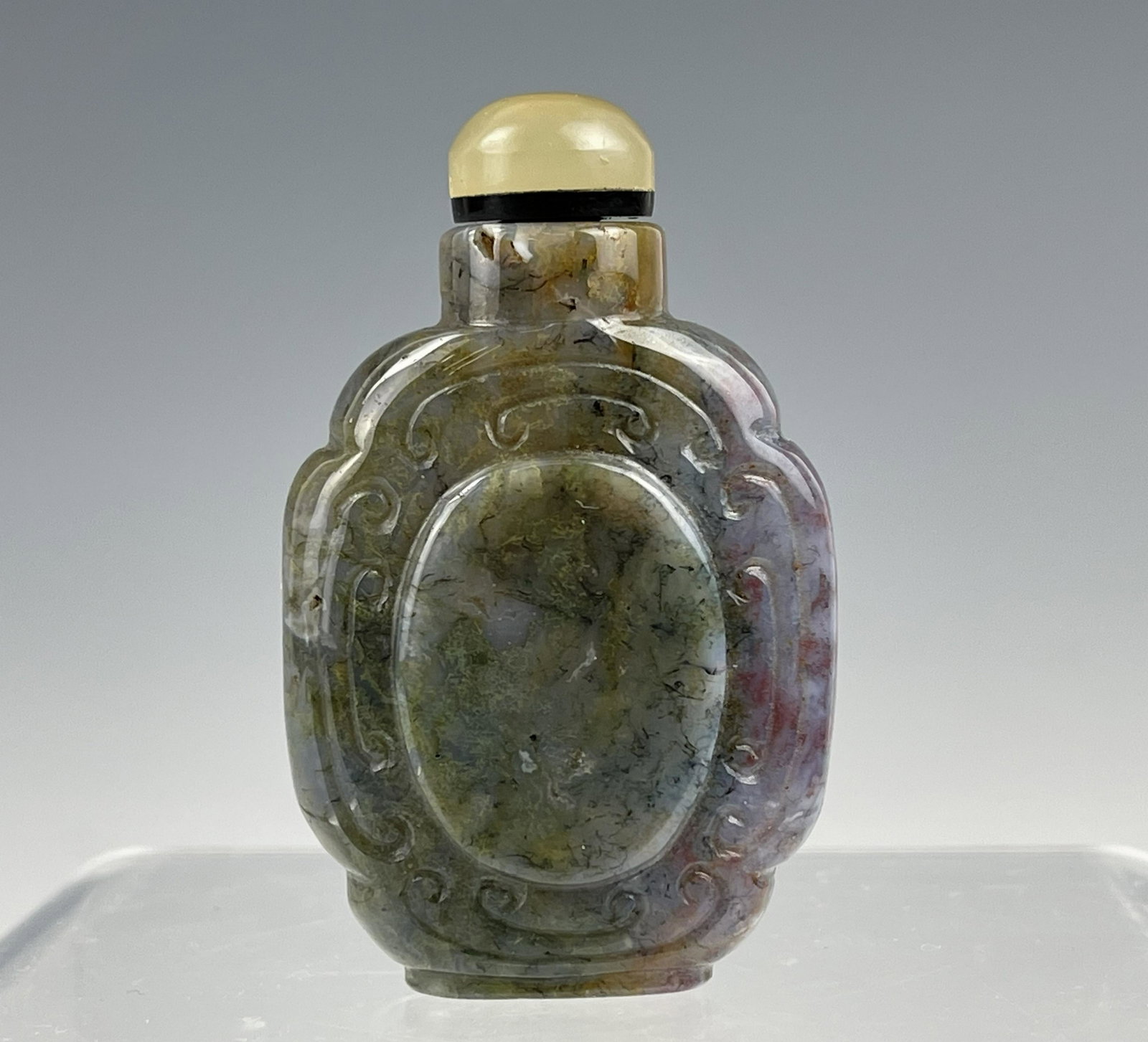 A Chinese Carved Jade Snuff Bottle: A Chinese Carved Jade Snuff Bottle, H 6.2cm. (2.8 in.), Preview from Aug. 22nd to 26th from 2:00 PM TO 6:00 PM Eastern Time, Location: 15229 Display Court, Rockville MD 20850