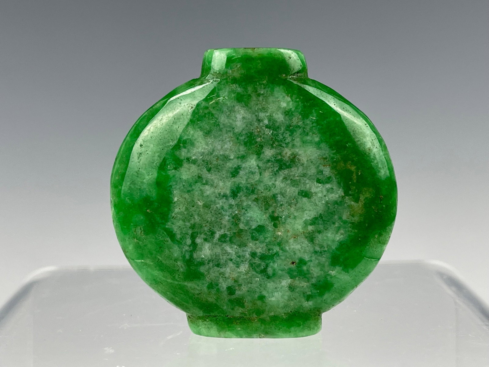 A Chinese Jade Snuff Bottle: A Chinese Jade Snuff Bottle, H 5 cm.( 2.2 in.),Preview from Aug. 22nd to 26th from 2:00 PM TO 6:00 PM Eastern Time, Location: 15229 Display Court, Rockville MD 20850
