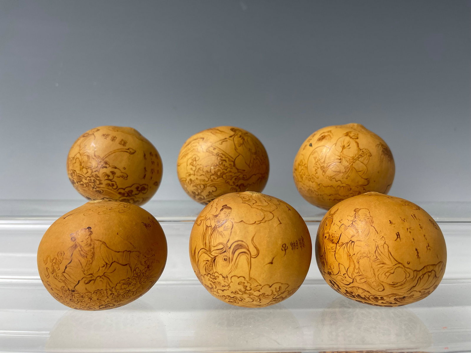 The Six Immortals Chinese Carving Gourd Artifact: The Six Immortals Chinese Carving Gourd Artifact,D 6 cm. (2.5 in.) x 6, Preview from Aug. 22nd to 26th from 2:00 PM TO 6:00 PM Eastern Time, Location: 15229 Display Court, Rockville MD 20850