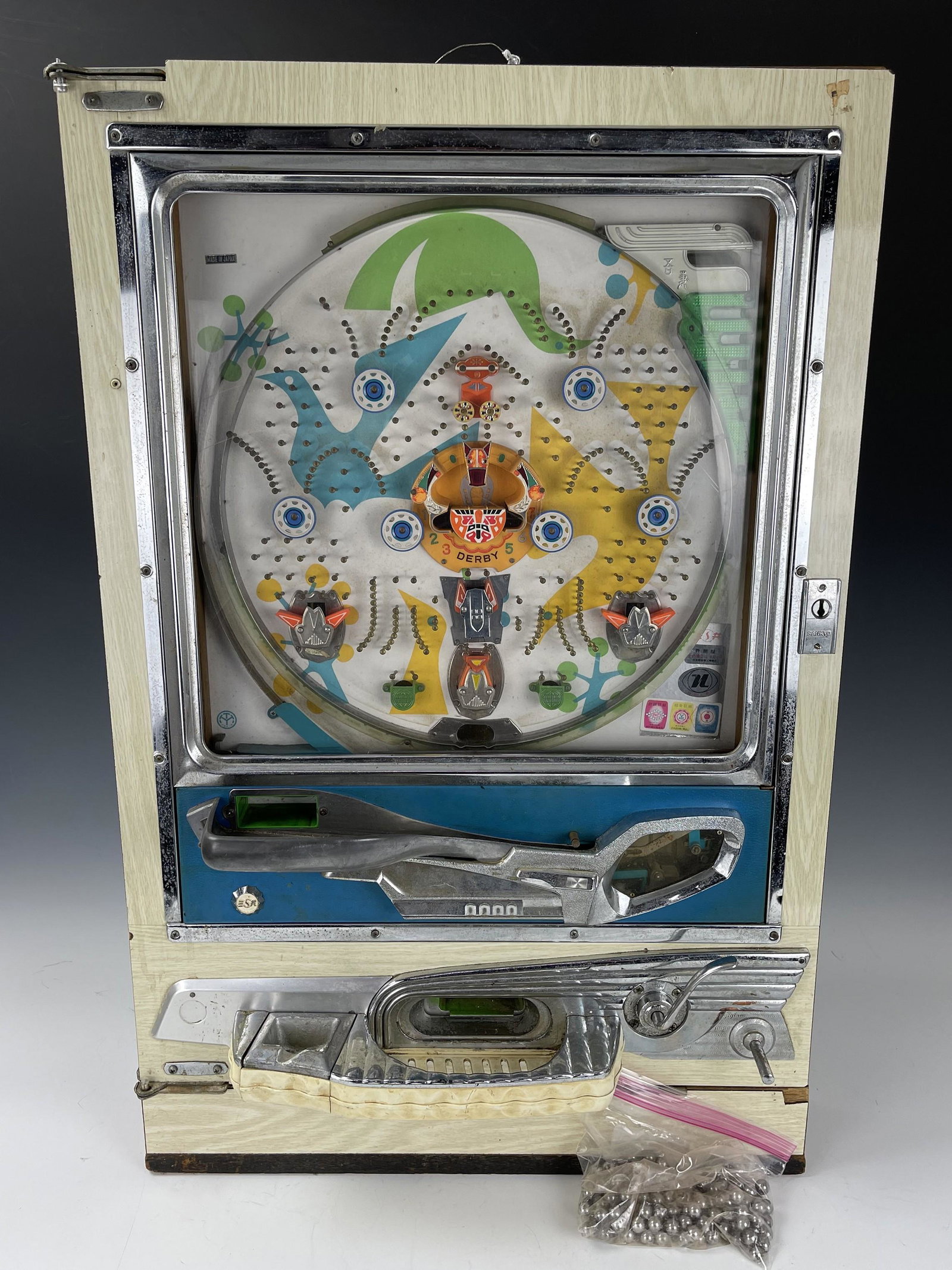 Vintage Japan Pachinko Machine With Balls: Vintage Japan Pachinko Machine With Balls, Dimensions 22 x 33.5 x 10 in.Weight 55 lbs,Preview from Aug. 22nd to 26th from 2:00 PM TO 6:00 PM Eastern Time, Location: 15229 Display Court, Rockville MD 2