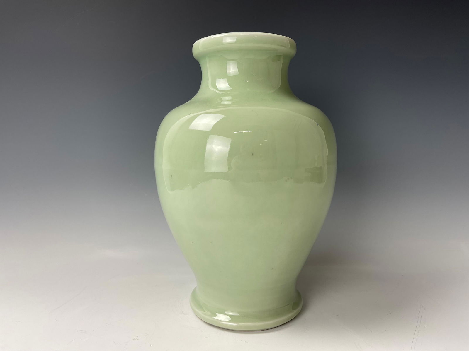 A Chinese Celadon Porcelain Vase: A Chinese Celadon Porcelain Vase,H30cm(11.7 in.),Preview from Oct. 24th to 28th from 2:00 PM TO 6:00 PM Eastern Time, Location: 15229 Display Court, Rockville MD 20850.