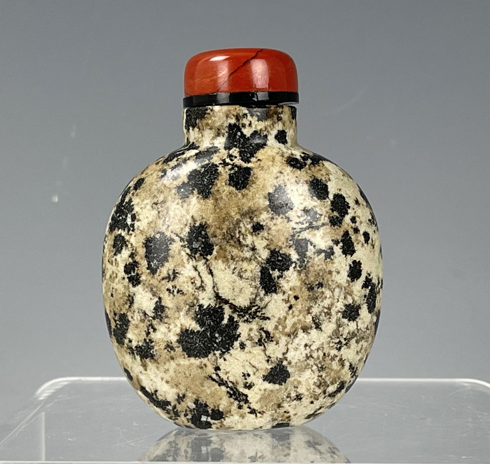 A Chinese Flattened Puddingstone Snuff Bottle (1 of 4)