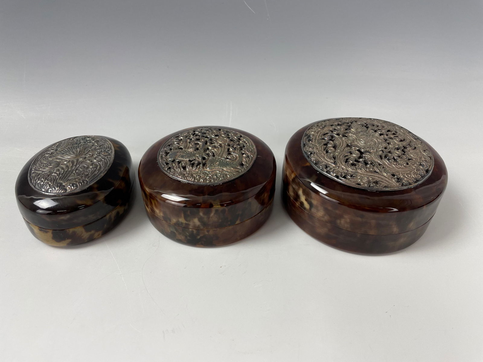 A Group of Three Decorative Boxes: A Group of Three Decorative Boxes. D: 3 in. (7.62 cm) to 4 in. (10.16 cm)