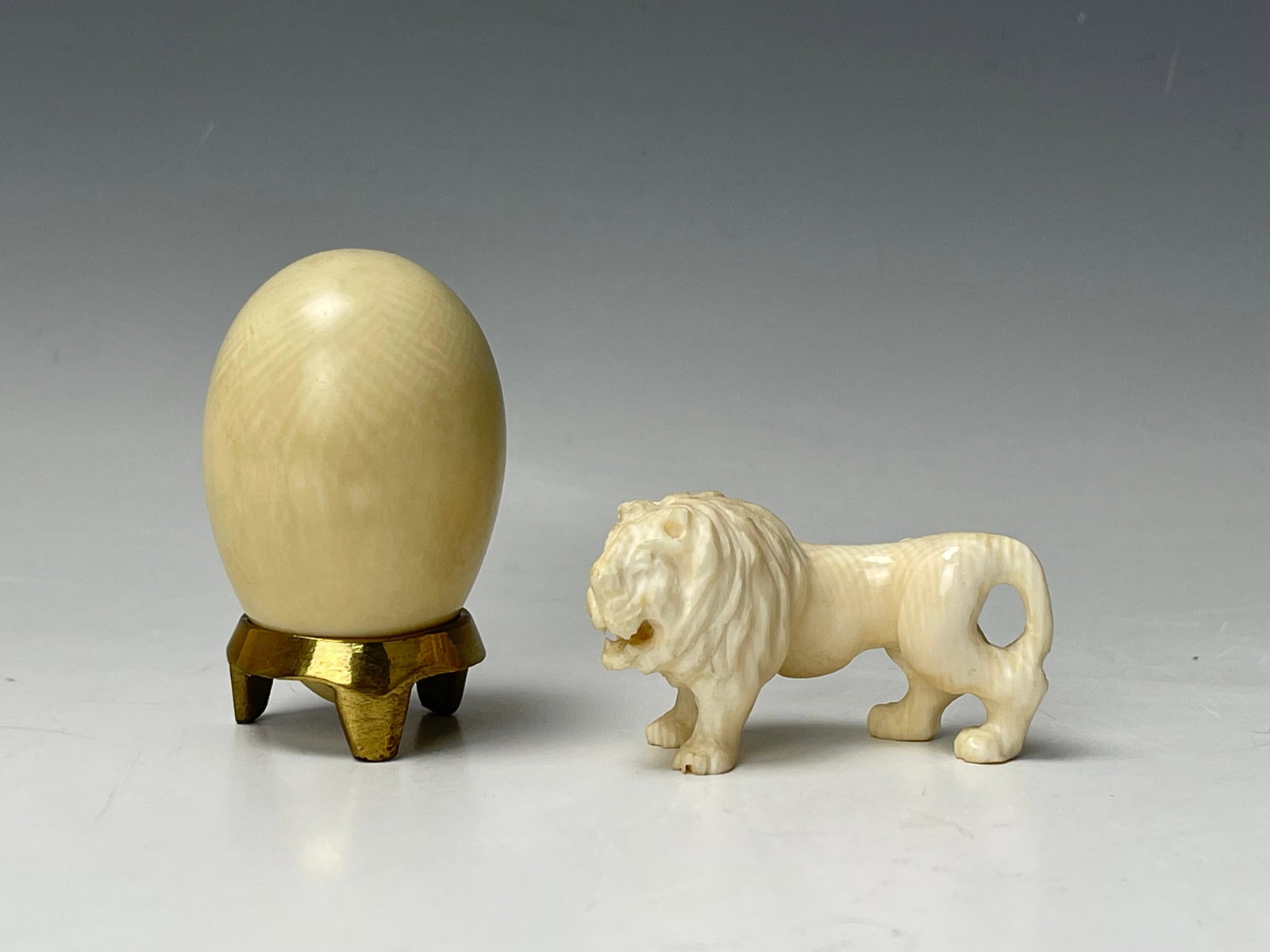 Vintage Bone Carved Lion and Egg: Vintage Bone Carved Lion and Egg,egg H5.8 cm,lion W 5.8cm,Preview from Apr. 17th to 21st from 1:00 PM TO 5:00 PM Eastern Time, Location: 15229 Display Court, Rockville MD 20850.