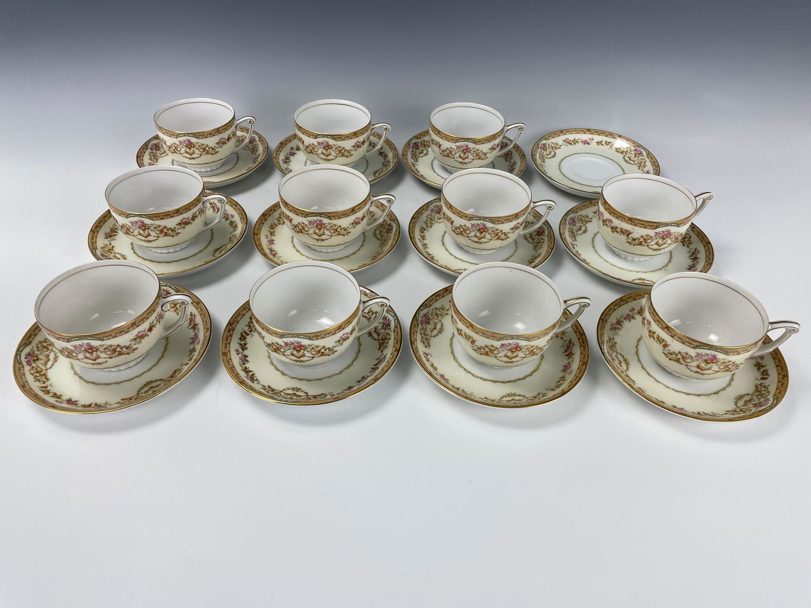 Eleven Teacup and Saucers by FNC Narumi China Occupied Japan: Eleven Teacup and Saucers by Narumi China Occupied Japan. Teacup H: 6 cm (2.3 in.) Saucer D: 14.5 cm (5.6 in.) Preview from Apr. 17th to 21st from 1:00 PM TO 5:00 PM Eastern Time, Location: 15229 Disp