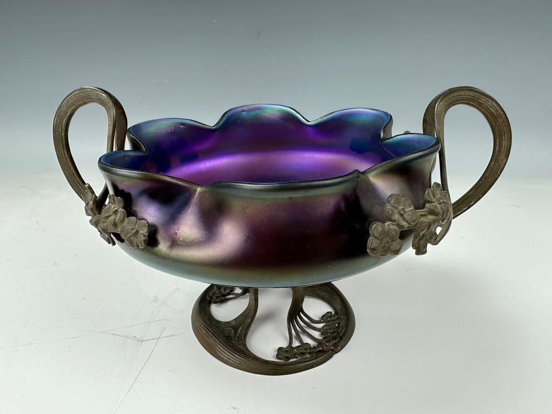 Art Nouveau purple bronze mounted Loetz iridescent glass bowl: Art Nouveau purple bronze mounted Loetz iridescent glass bowl,W 10in(25.5cm) x H 5.5in(14cm),Preview from Aug. 21st to 25th from 1:00 PM TO 5:00 PM Eastern Time, Location: 15229 Display Court, Rockvil