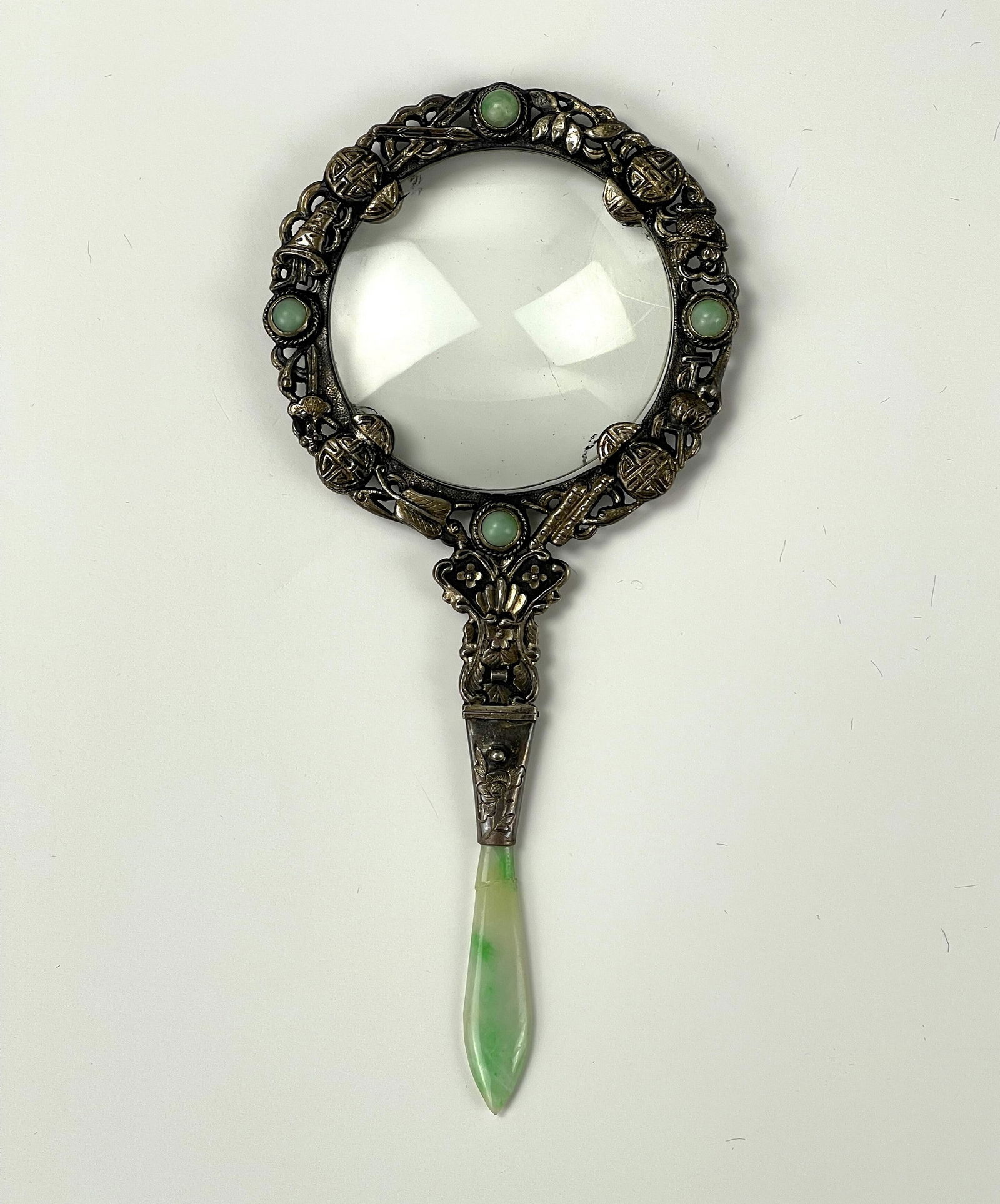 A Magnifying with Jadeite Handle and Jade Inlays Sung Mark: A Magnifying Glass with Jadeite Handle and Jade Inlays Sung Mark, repared,L 15.8 cm(6.2 in.), diameter 7cm(2.8 in.),Preview from Oct. 2nd to 6th from 1:00 PM TO 5:00 PM Eastern Time, Location: 15229 D