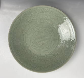 A Korean Celadon Porcelain Plate: A Korean Celadon Porcelain Plate, D 37 cm(14.5 in.),Preview from Oct. 2nd to 6th from 1:00 PM TO 5:00 PM Eastern Time, Location: 15229 Display Court, Rockville MD 20850.