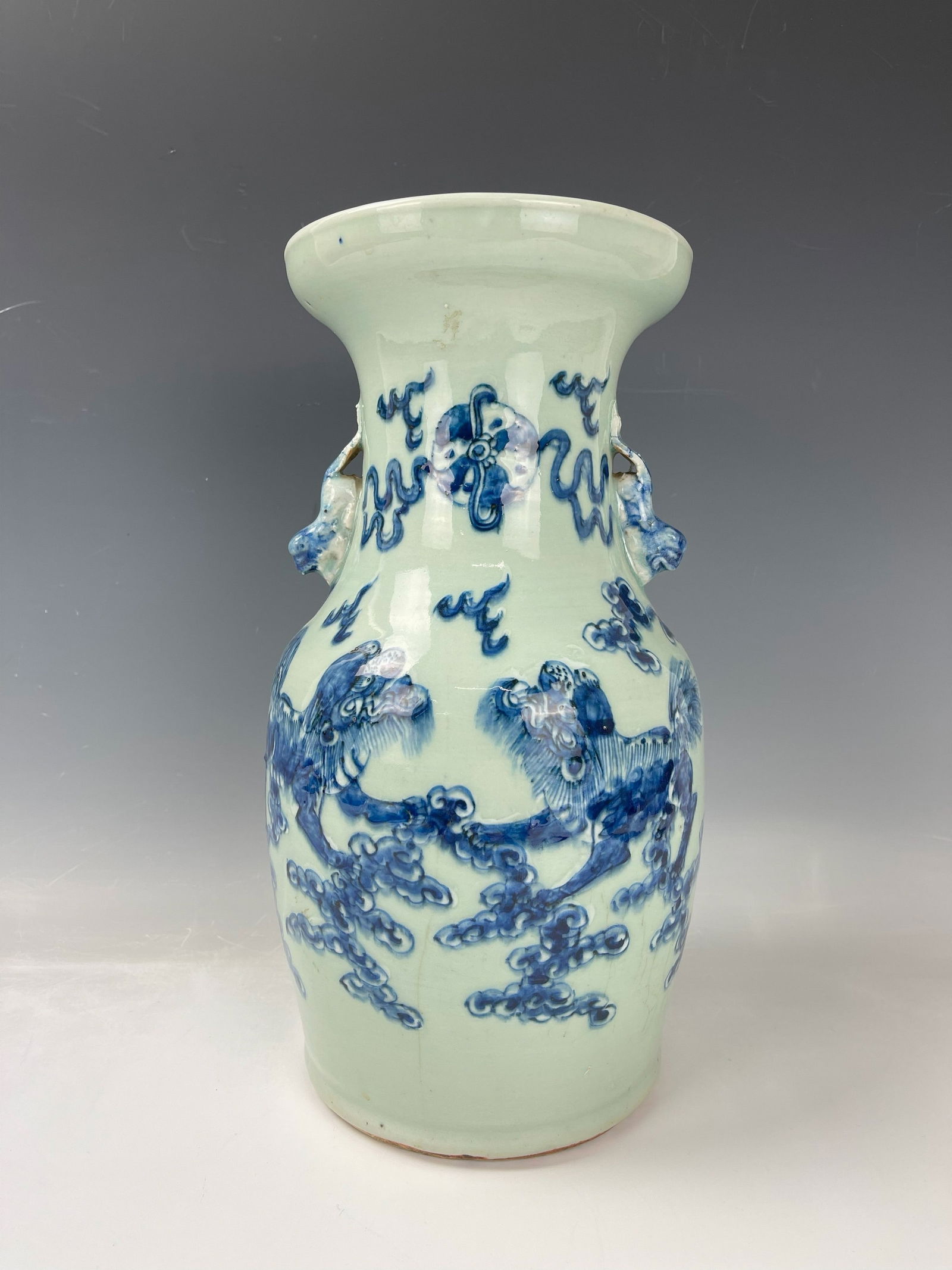 Qing Dynasty Blue and White Lions Dancing Porcelain Vase: Qing Dynasty Blue and White Lions Dancing on Celadon Porcelain Vase,H 33.5 cm(13.3 in.),Preview from Dec. 11th to 15th from 1:00 PM TO 5:00 PM Eastern Time, Location: 15229 Display Court, Rockville MD