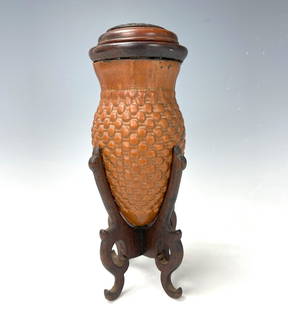 A Chinese Gourd Molded Cricket Cage with Wood Stand: A Chinese Gourd Molded Cricket Cage with Wood Stand, H 17.7 cm (7 in.), Preview from Dec. 11th to 15th from 1:00 PM TO 5:00 PM Eastern Time, Location: 15229 Display Court, Rockville MD 20850.