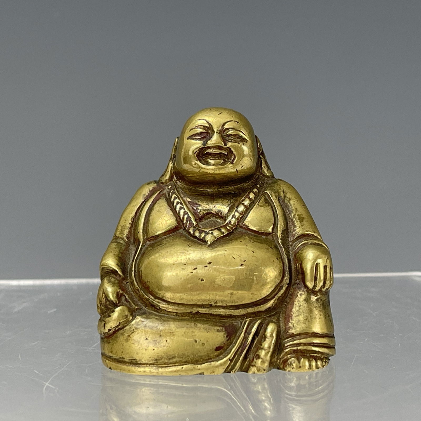 A Chinese Brass Happy Buddha Statue (1 of 5)