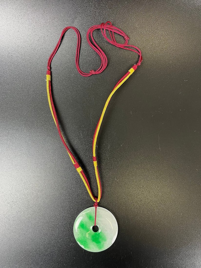 A Chinese Necklace with Green Jadeite Bi Pendant (1 of 4)