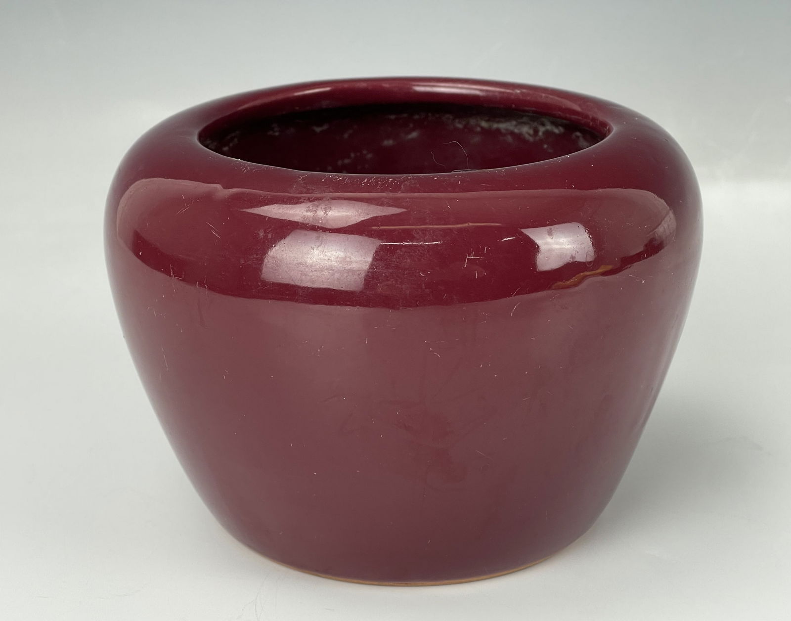A Chinese Red Glazed Ceramic Jar (1 of 4)