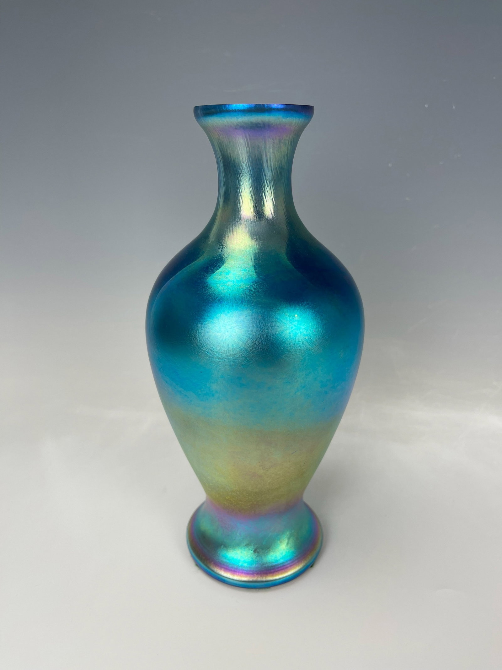 A Vintage Blue Glass Vase: A Vintage Blue Glass Vase,H 22 cm (8.7 in.), Preview from Feb.19th to 23rd from 1:00 PM TO 5:00 PM Eastern Time, Location: 15229 Display Court, Rockville MD 20850.