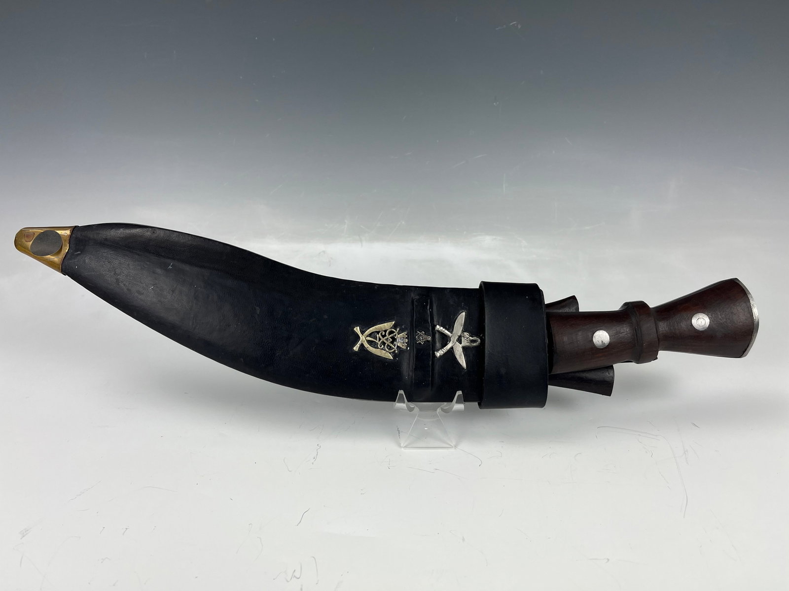 Authentic Vintage Kukri embellished with Gurkha Unit Emblems: This vintage kukri is the real deal—an authentic weapon adorned with Gurkha unit emblems, symbolizing its rich history and heritage. Crafted for combat, it stands as a testament to the legendary pro