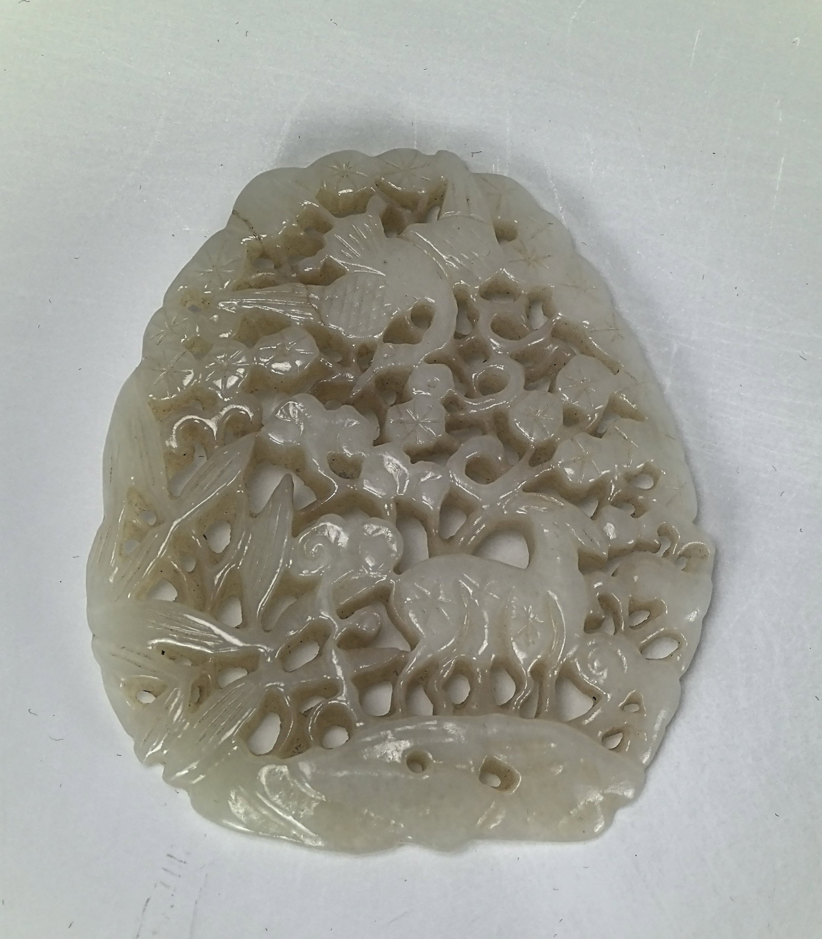 A Chinese Jade Pendant Carved Crane and Dear: A Chinese Jade Pendant Carved Crane and Dears,H 7 cm (2.8in.) x W 6 cm(2.4 in.), Preview from Apr. 22nd to 26th from 1:00 PM TO 5:00 PM Eastern Time, Location: 15229 Display Court, Rockville MD 20850.
