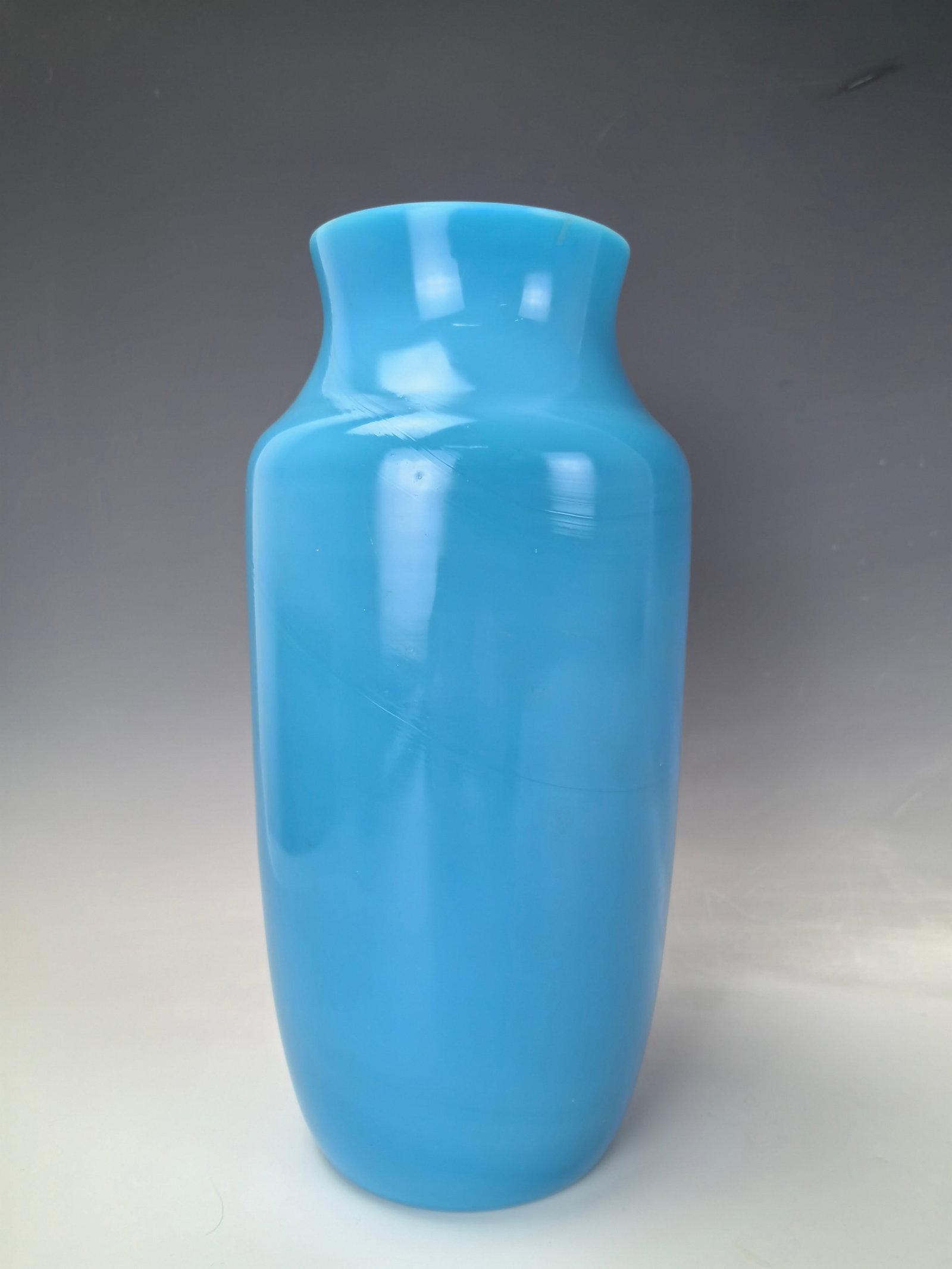 A Chinese Sky Blue Peking Glass Vase: A Chinese Sky Blue Peking Glass Vase,H 26 cm(10.2 in.), Preview from Apr. 22nd to 26th from 1:00 PM TO 5:00 PM Eastern Time, Location: 15229 Display Court, Rockville MD 20850.