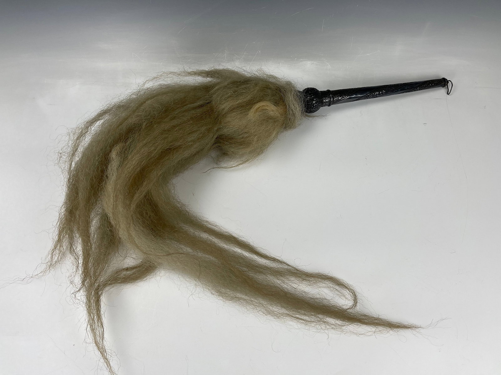 Antique Chinese Taoist Duster with Silver Handle: Antique Chinese Taoist Duster with Silver Handle, perhaps Yak tail or horsetail, handle L 30 cm(12 in.), Provenance: PROPERTY OF HELEN FUGH HAYS - FU HAILAN (1931-2016) WASHINGTON, D.C. FU HAILAN, MRS