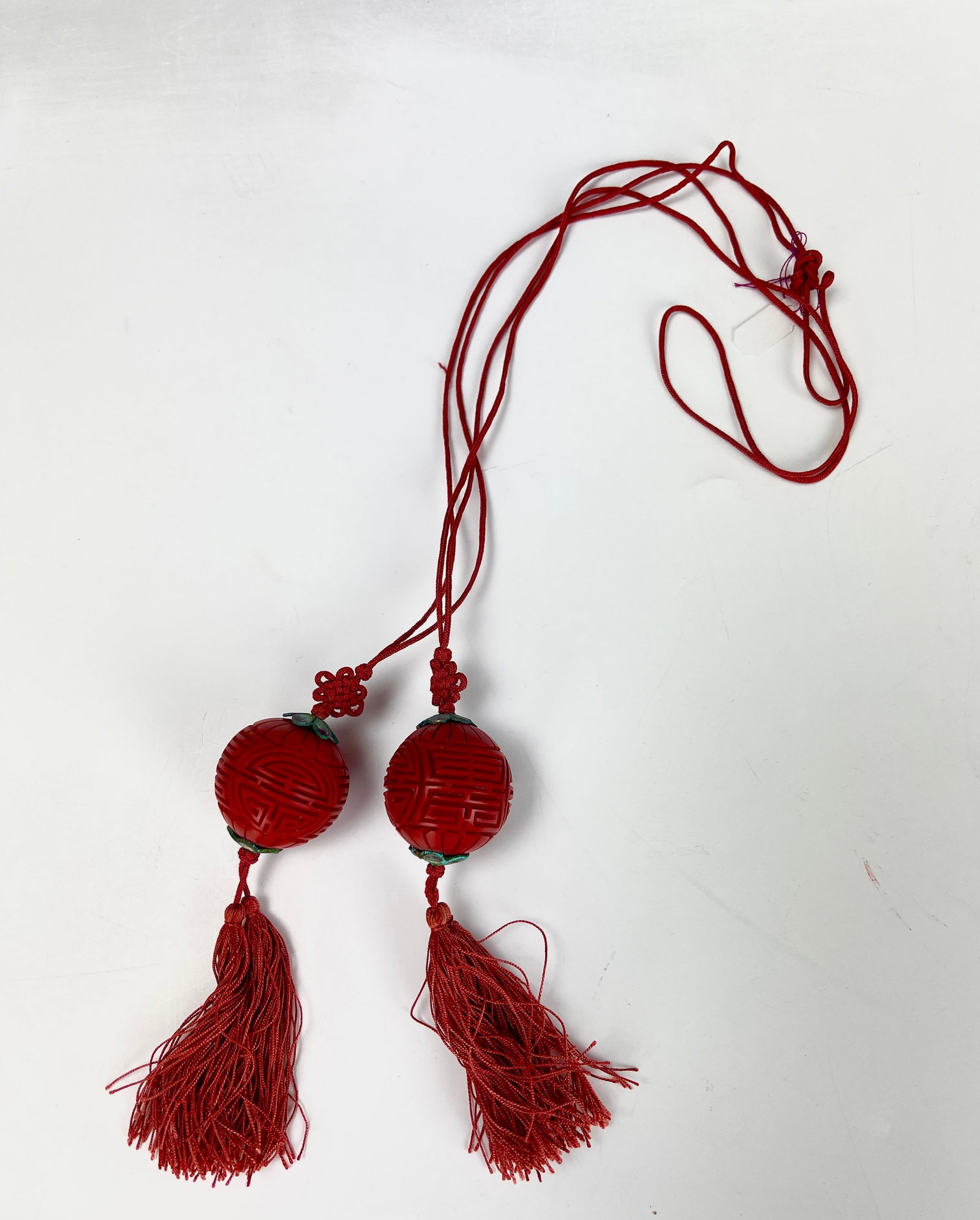 Two Vintage Chinese Cinnabar Necklace Pendants: Two Vintage Chinese Cinnabar Necklace Pendants. L 39 cm (15in.) x2,Dimensions: D 3 cm, condition: reapird. Preview from April. 22nd to 26th from 1:00 PM TO 5:00 PM Eastern Time,Location: 15229 Display