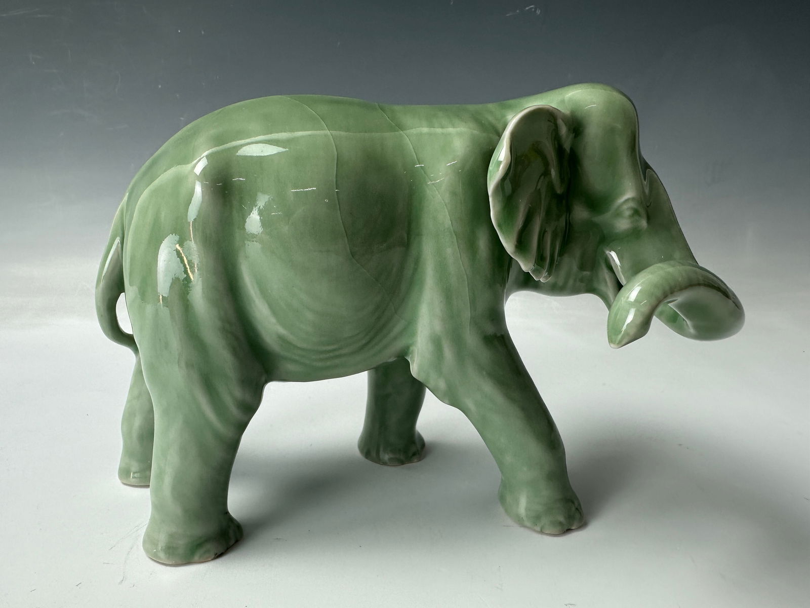 A Chinese Celadon  Porcelain Elephants Status (1 of 6)