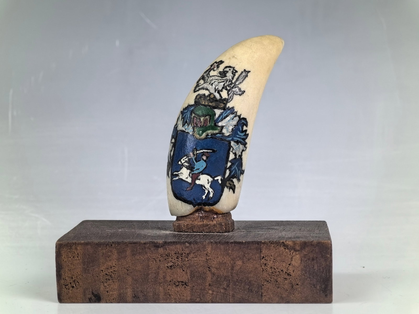 Antique Whale Teeth with Hand painted Coat of Arms: Antique Whale Teeth Depicting Family Crest Painting, Hand painted Coat of Arms, H 10 cm (4 in.), Preview from May 27th to 31st from 1:00 PM TO 5:00 PM Eastern Time, Location: 15229 Display Court, Rock