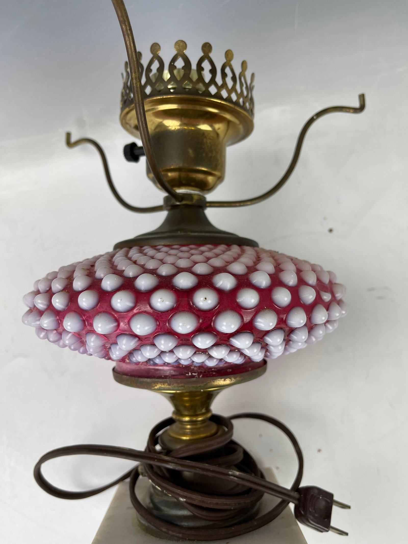 Cranberry Opalescent Hobnail Glass Lamp Possibly by Fenton: Cranberry Opalescent Hobnail Glass Lamp possibly by Fenton, H 28 cm(11 in.) x W 17.8cm(7 in.), Preview from May 27th to 31st from 1:00 PM TO 5:00 PM Eastern Time, Location: 15229 Display Court, Rockvi