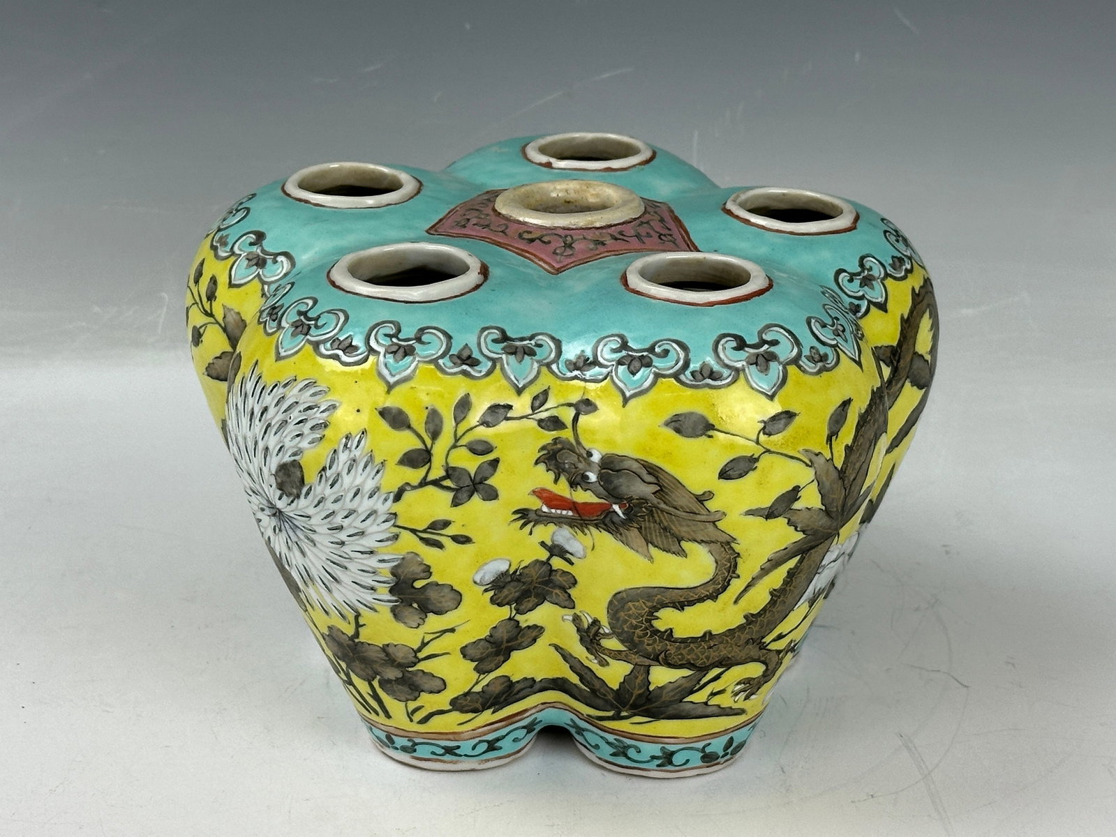 A Famille Rose Vase With 6 Sprouts Painted with Dragons: A Famille Rose Vase With 6 Sprouts Painted with Dragons amid flowers on yellow and turquoise grounds. H 12cm, W 18cm. Preview from Jun. 24th to 28th from 1:00 PM TO 5:00 PM Eastern Time, Location: 152
