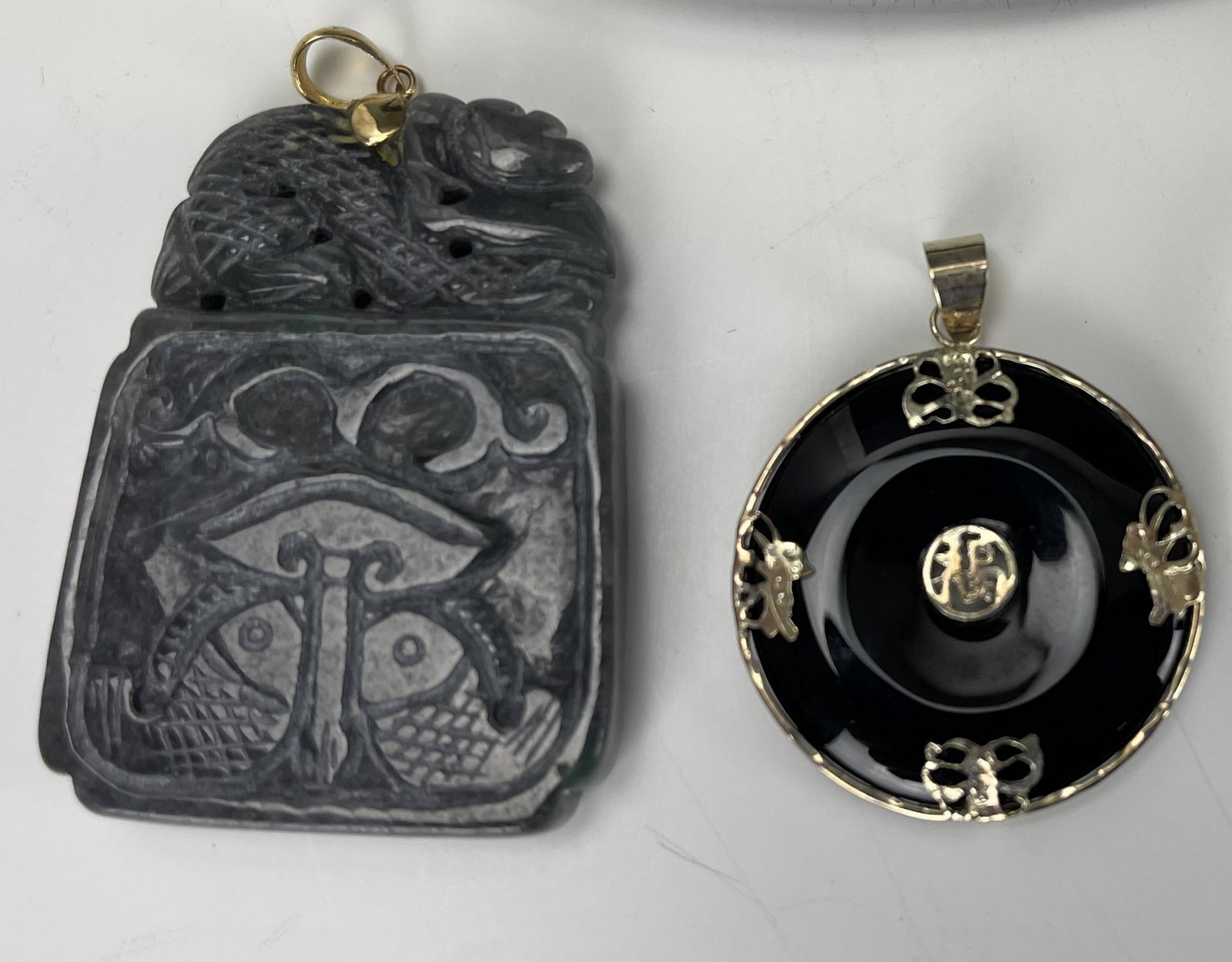 Two Chinese Carved Jade Pendants: Two Chinese Carved Jade Pendants, the big one size 4.5 x 3 cm. Preview from Jun. 24th to 28th from 1:00 PM TO 5:00 PM Eastern Time, Location: 15229 Display Court, Rockville MD 20850.