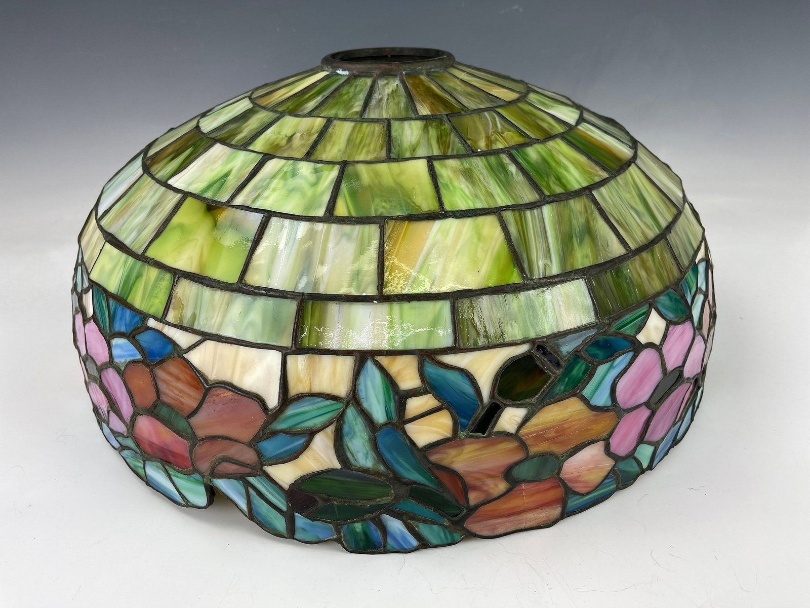 Vintage Stain and Leaded Glass Lamp Shade: Vintage Stain and Leaded Glass Lamp Shade,W 47 cm (18.5 in.)x H 21 cm (8.3 in.). Preview from Jun. 24th to 28th from 1:00 PM TO 5:00 PM Eastern Time, Location: 15229 Display Court, Rockville MD 20850.
