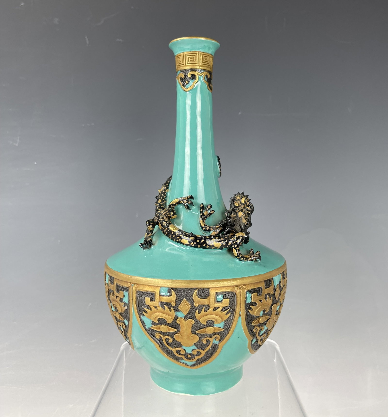 Chinese Porcelain Molded Turquoise Vase with Taotie Masks and Dragon: Chinese Porcelain Molded Turquoise Vase with Taotie Masks and Dragon on the neck.H 23 cm(9 in.) . Preview from Aug. 26th to 30th from 1:00 PM TO 5:00 PM Eastern Time, Location: 15229 Display Court, Ro