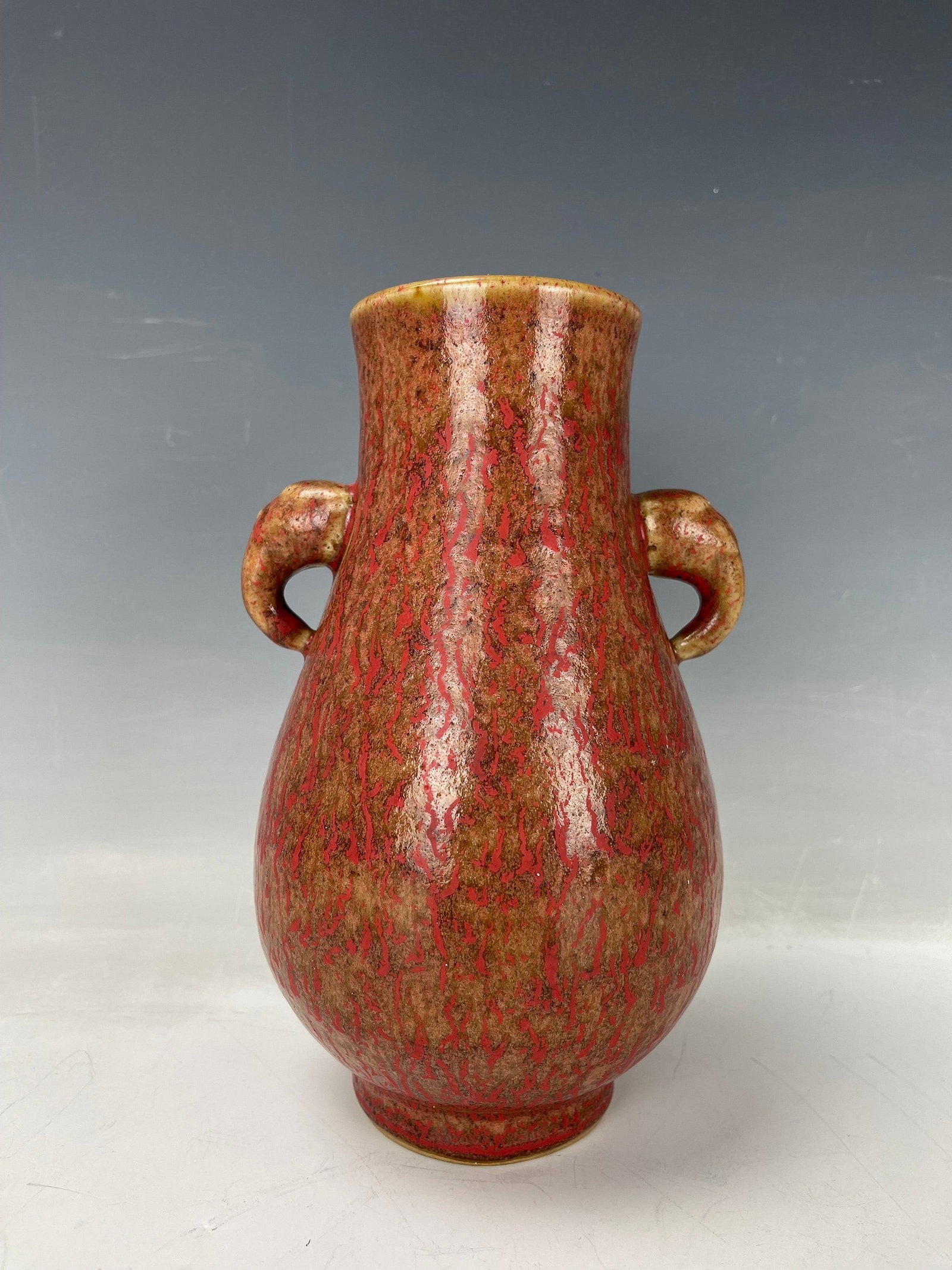 Chinese Porcelain Red Flambe Vase with Double Elephant Ears: Red flambe vase with double elephant ears, H 20 cm(8 in.). Preview from Aug. 26th to 30th from 1:00 PM TO 5:00 PM Eastern Time, Location: 15229 Display Court, Rockville MD 20850.