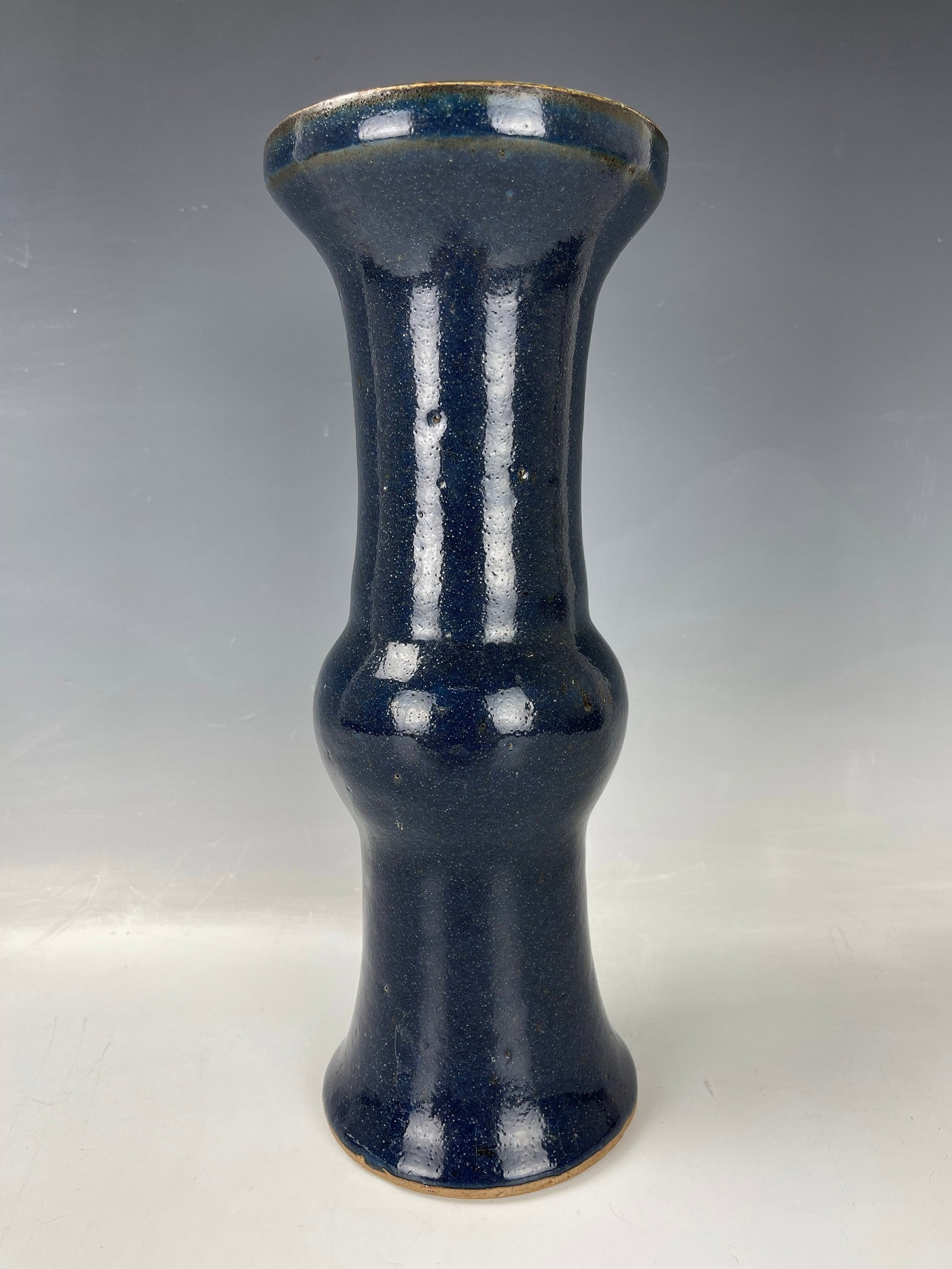 Chinese Blue Glazed Porcelain Gu Vase: Chinese Blue Glazed Porcelain Gu Vase. H 28 cm(11 in.). Preview from Aug. 26th to 30th from 1:00 PM TO 5:00 PM Eastern Time, Location: 15229 Display Court, Rockville MD 20850.