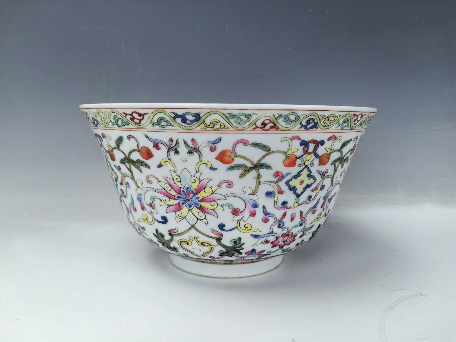 Large Famille Rose Porcelain Bowl with Character of Longevity Jiaqing Mark: Large bowl painted in famille rose character of longevity on interior and scrolling lotus on the exterior. Jiaqing Mark,D 18.5 cm(7.3 in.) x H 10 cm(3.9 in.). Preview from Aug. 26th to 30th from 1:00 