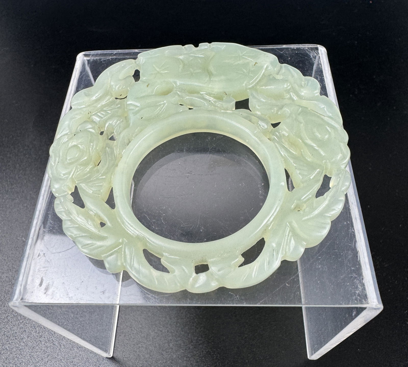 A Chinese Carved Jade Pendant: A Chinese Carved Jade Pendant, D 7 cm(2.8 in.). Preview from Aug. 26th to 30th from 1:00 PM TO 5:00 PM Eastern Time, Location: 15229 Display Court, Rockville MD 20850.