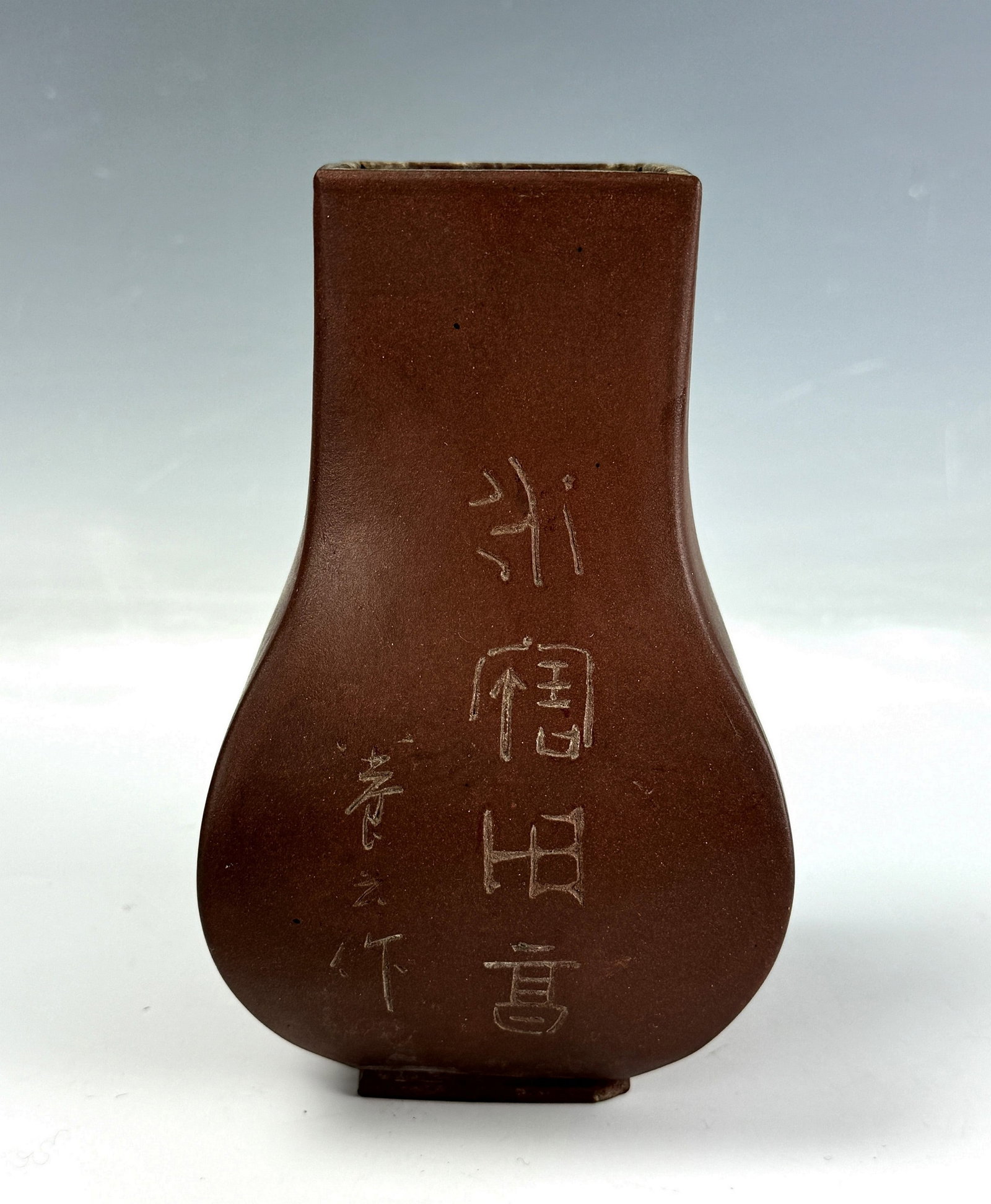 A Chinese Yixing Zisha Square Vase Marked: A Chinese Yixing Zisha Square Vase Marked,H 15.5 cm( 6.1in.) x W 9cm( 3.5in.). Preview from Aug. 26th to 30th from 1:00 PM TO 5:00 PM Eastern Time, Location: 15229 Display Court, Rockville MD 20850.