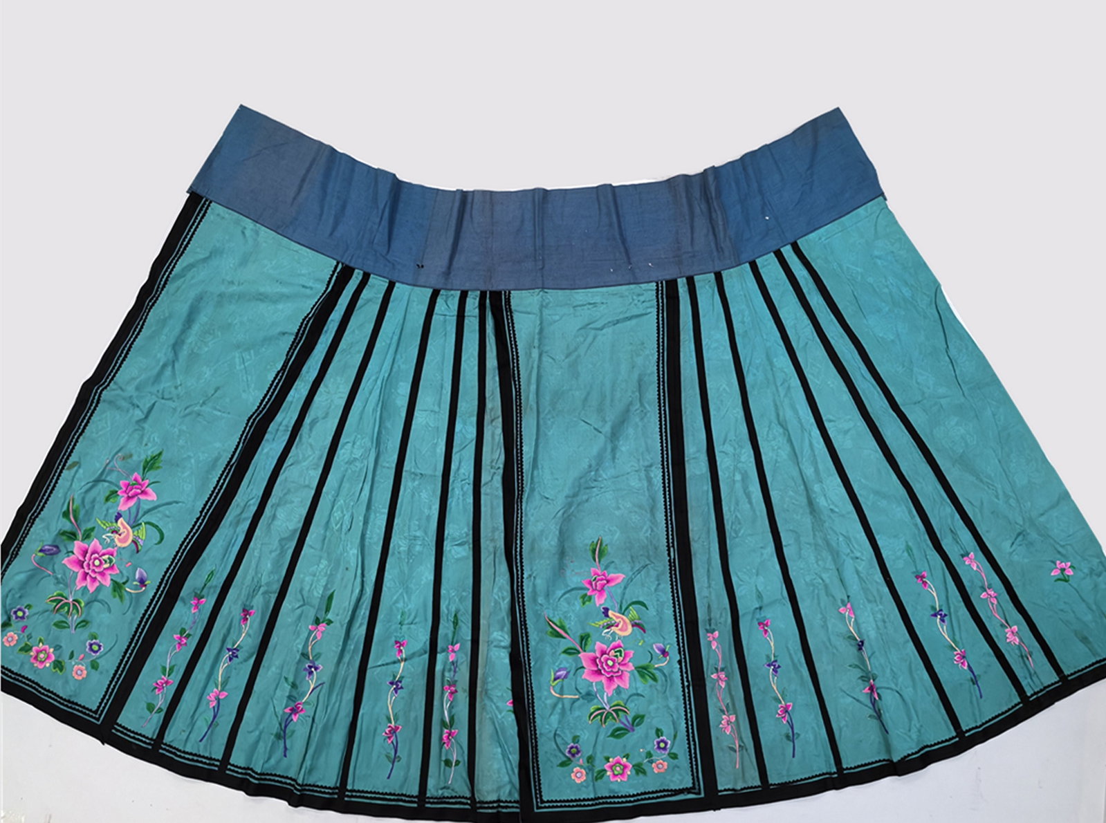 Antique Chinese Embroidered Green Skirt: Antique Chinese Embroidered Green Skirt,W 107 cm(42 in.) x H 91 cm(36 in.). Preview from Aug. 26th to 30th from 1:00 PM TO 5:00 PM Eastern Time, Location: 15229 Display Court, Rockville MD 20850.