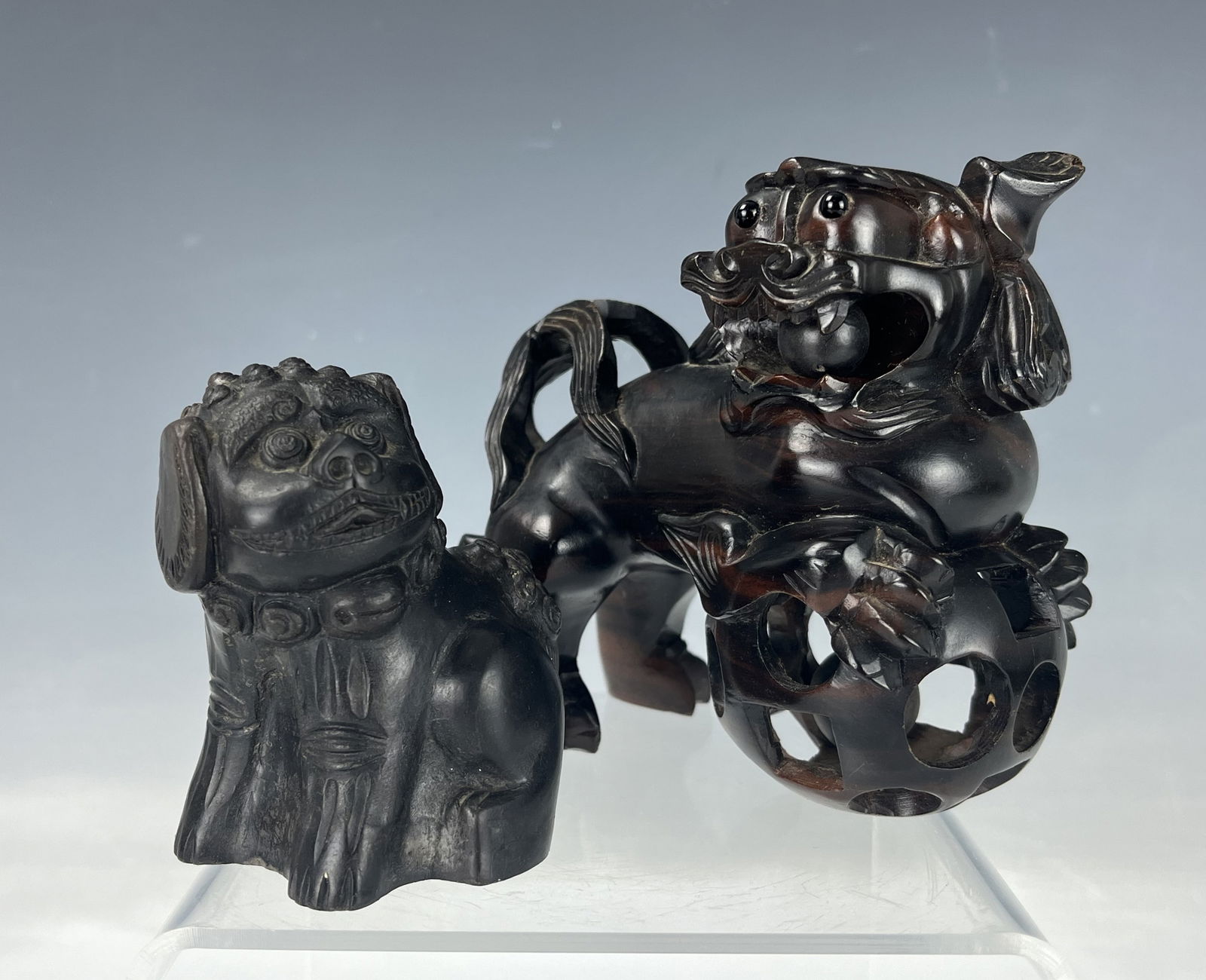 Two Lion Foo Dog Statue Pottery and Wood: Two Lion Foo Dog Statue Pottery and Wood,Ther is 3 mark on the Pottery lion. Big one H 11.4 cm(4.5 in.) x W 12.2 cm(4.8in.),small one H 8.6 cm(3.4 in.) x W7.6 cm(3 in.). Preview from Aug. 26th to 30th