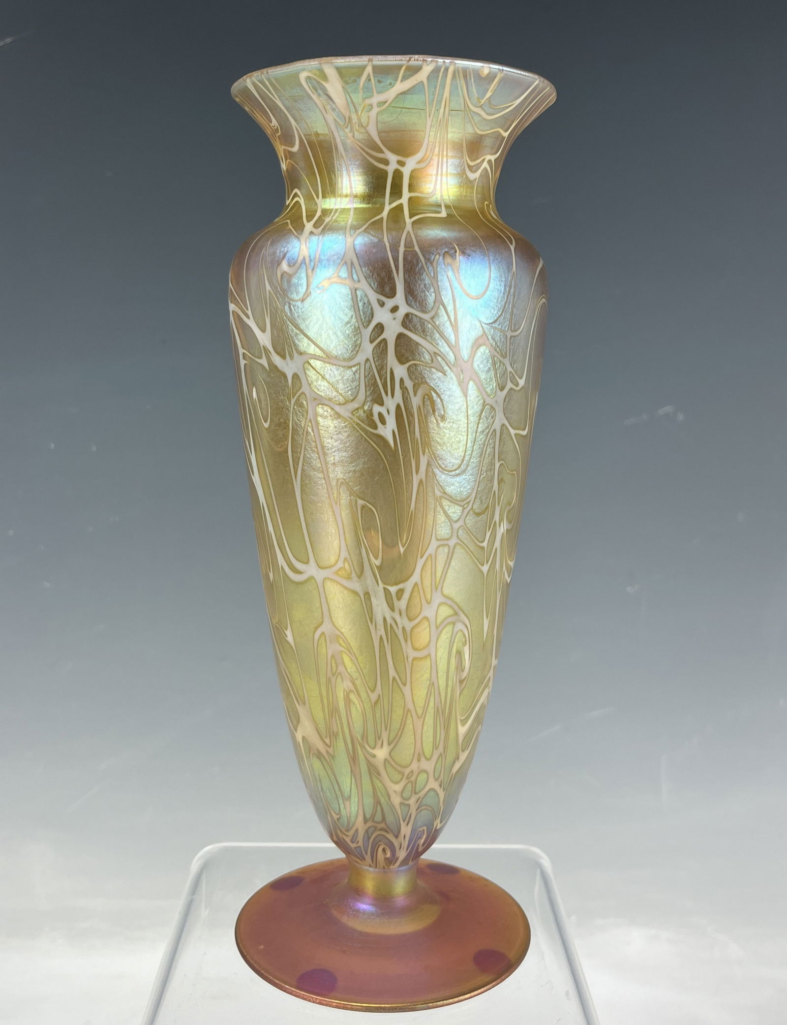 An Iridescent Glass Vase: An Iridescent Glass Vase, Dimensions: H 20.8 cm (8.2 in.) x W 7.6 cm (3 in.), Preview from Aug. 26th to 30th from 1:00 PM TO 5:00 PM Eastern Time, Location: 15229 Display Court, Rockville MD 20850.