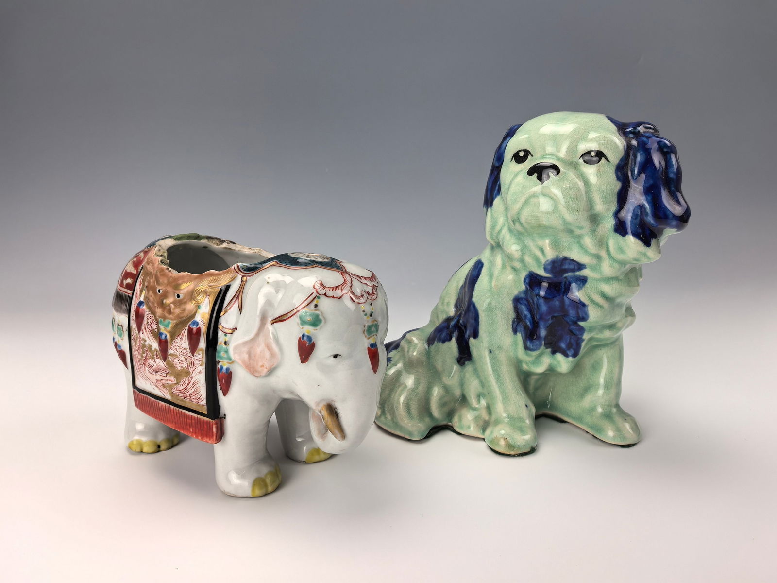 An Elephant and  Foo Dog Porcelain Statues (1 of 14)
