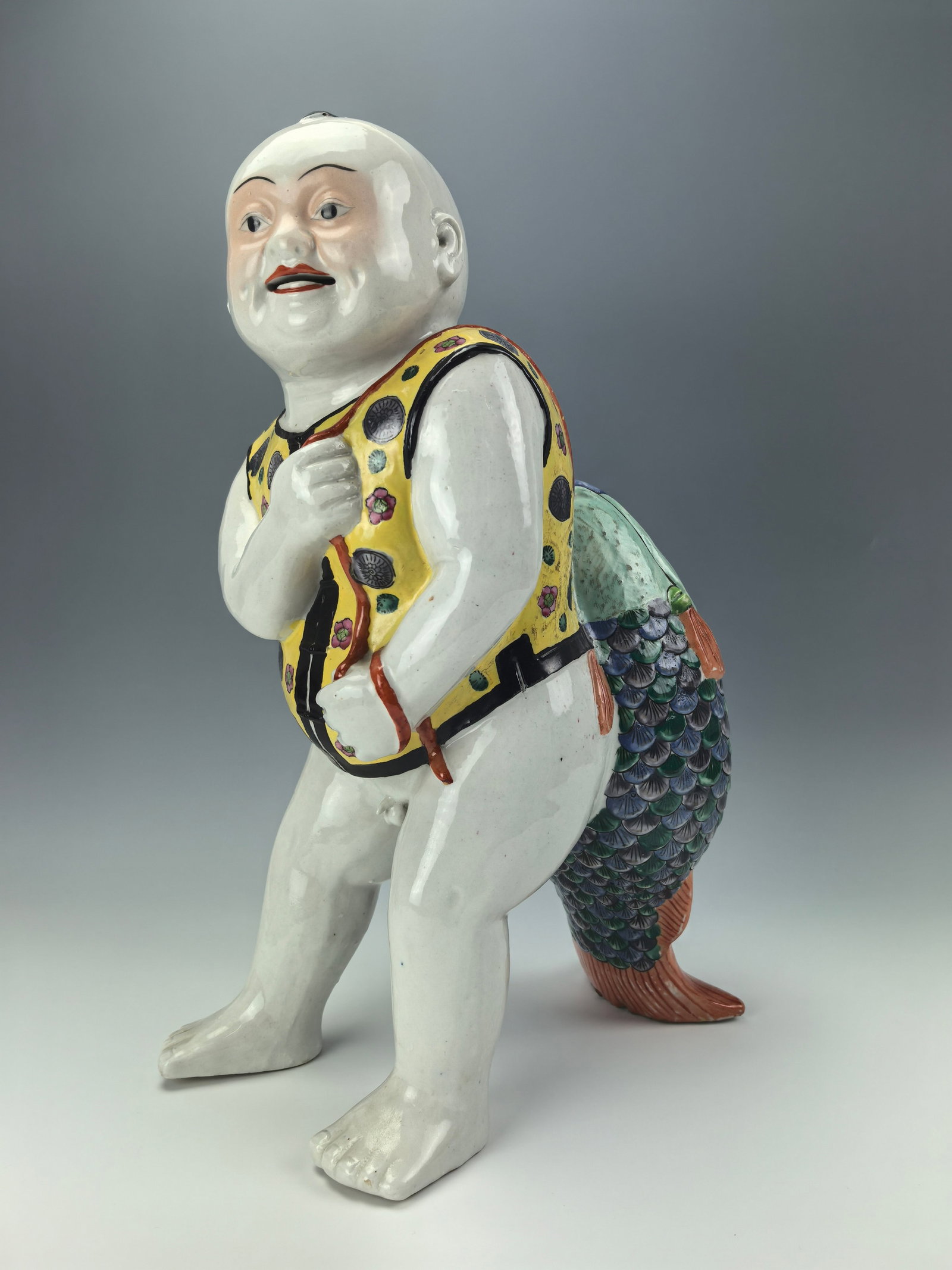Chinese Famille Rose Porcelain Statue of Happy Boy of Eternal Luck: Famille rose statue of Happy boy of eternal Luck,H 44cm(17in.), Preview from October. 14th to 18th from 1:00 PM TO 5:00 PM Eastern Time, Location: 15229 Display Court, Rockville MD 20850.