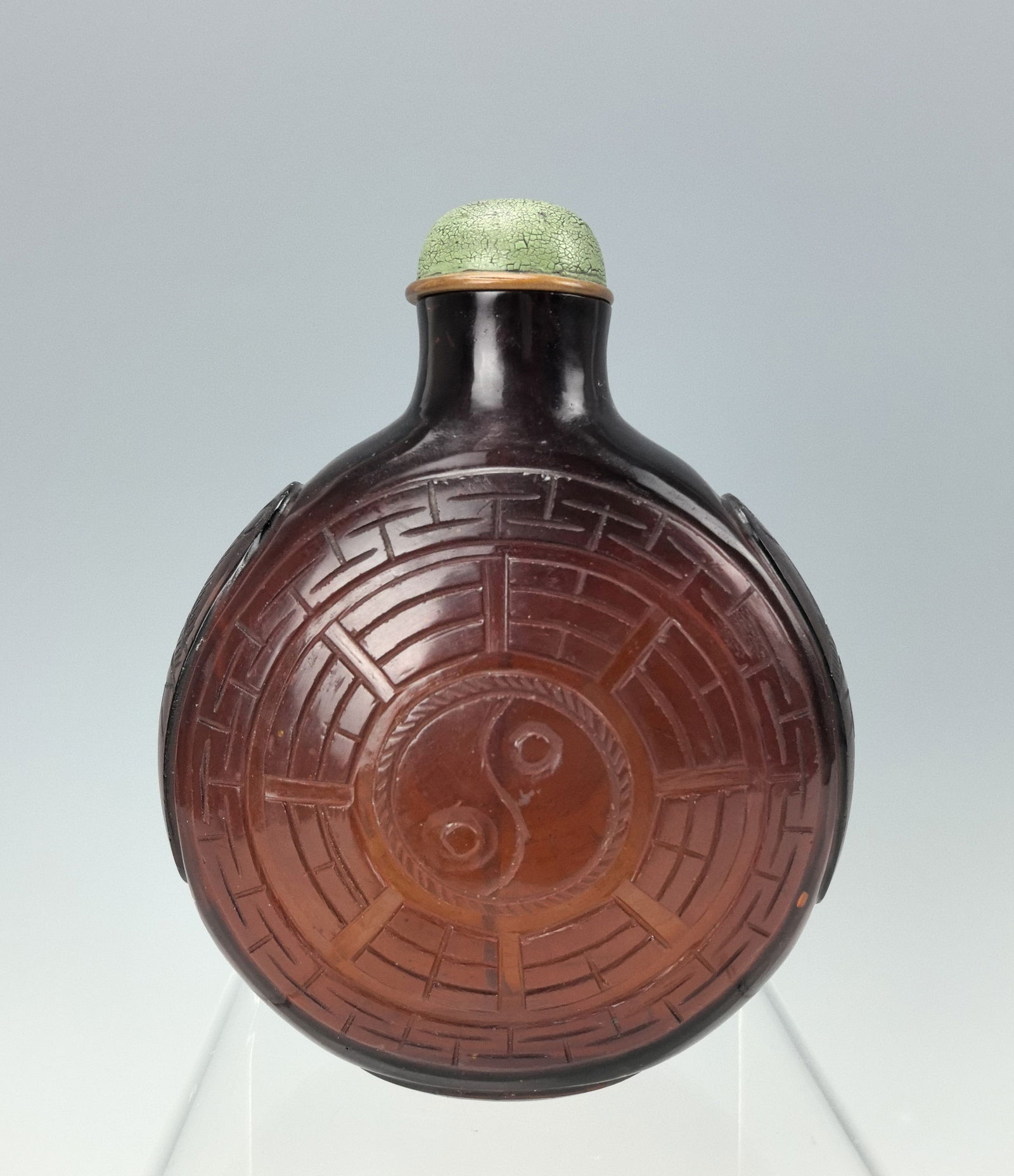 A large Peking Glass Snuff Bottle Carced Taichi and Eight Trigram (1 of 6)