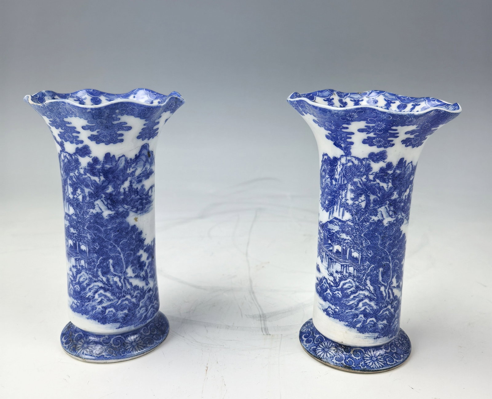 Pair of Arita Blue and White Porcelain Vase with Floral Mouth: Pair of Arita Blue and White Porcelain Vase with Floral Mouth, H 11 cm(4.3 in.) x2,sell as is.Preview from Dec.9th to 13th from 1:00 PM TO 5:00 PM Eastern Time, Location: 15229 Display Court, Rockvill